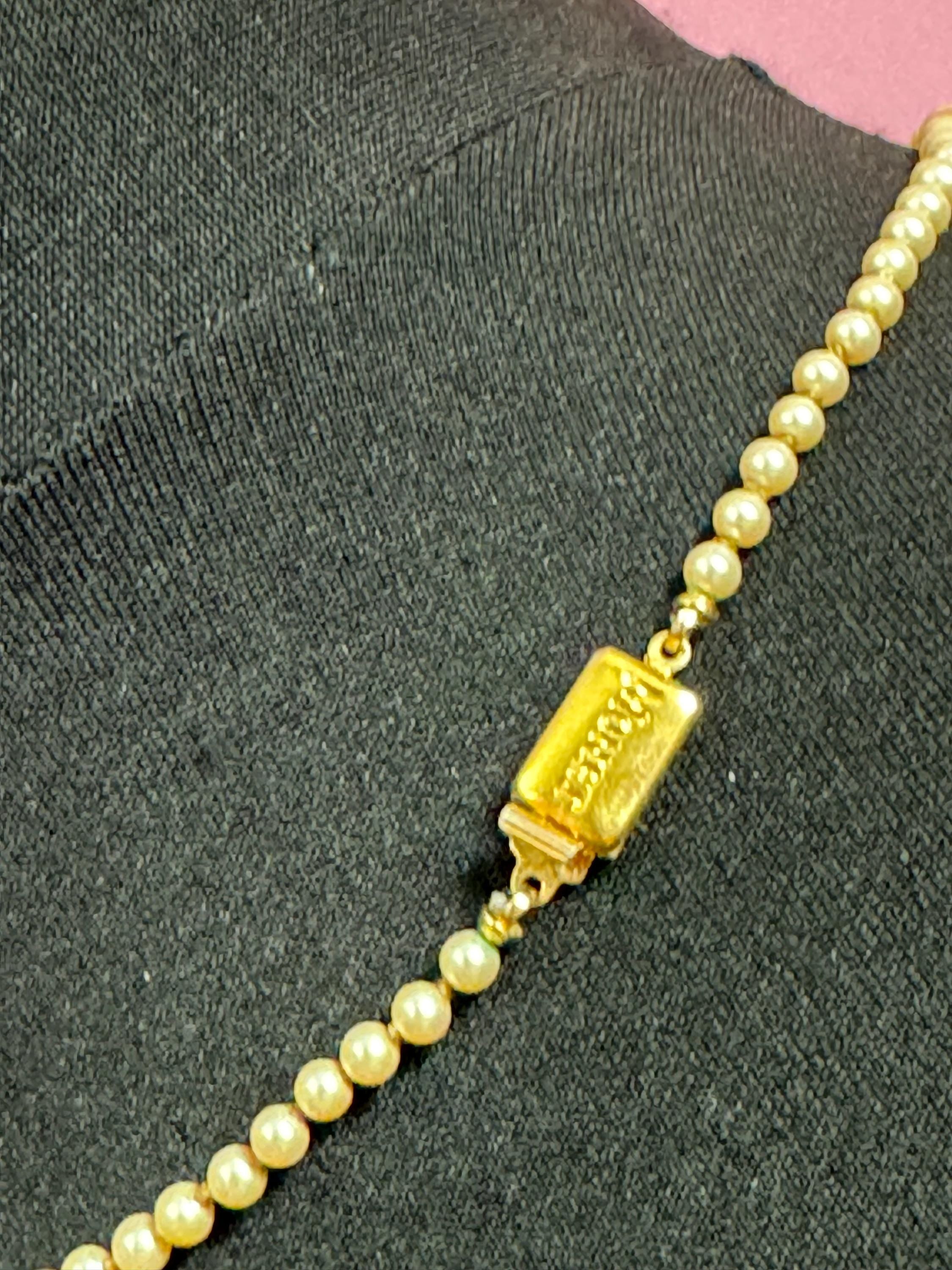 MONET signed Oyster cream knotted glass pearl necklace Vintage 47.5cm single strand graduated gold tone
