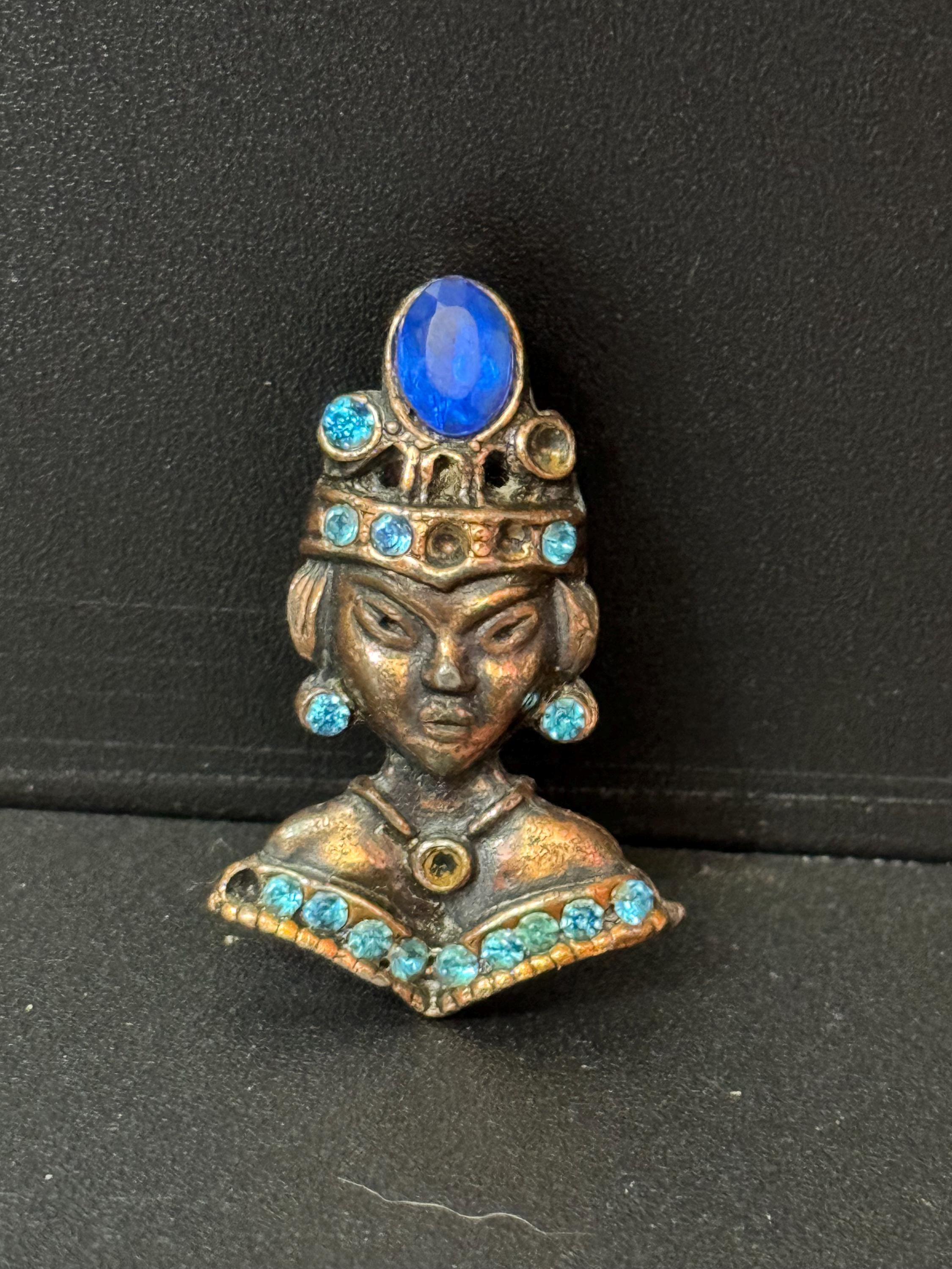 Vintage small copper gold tone African princess blue sapphire figural lady brooch