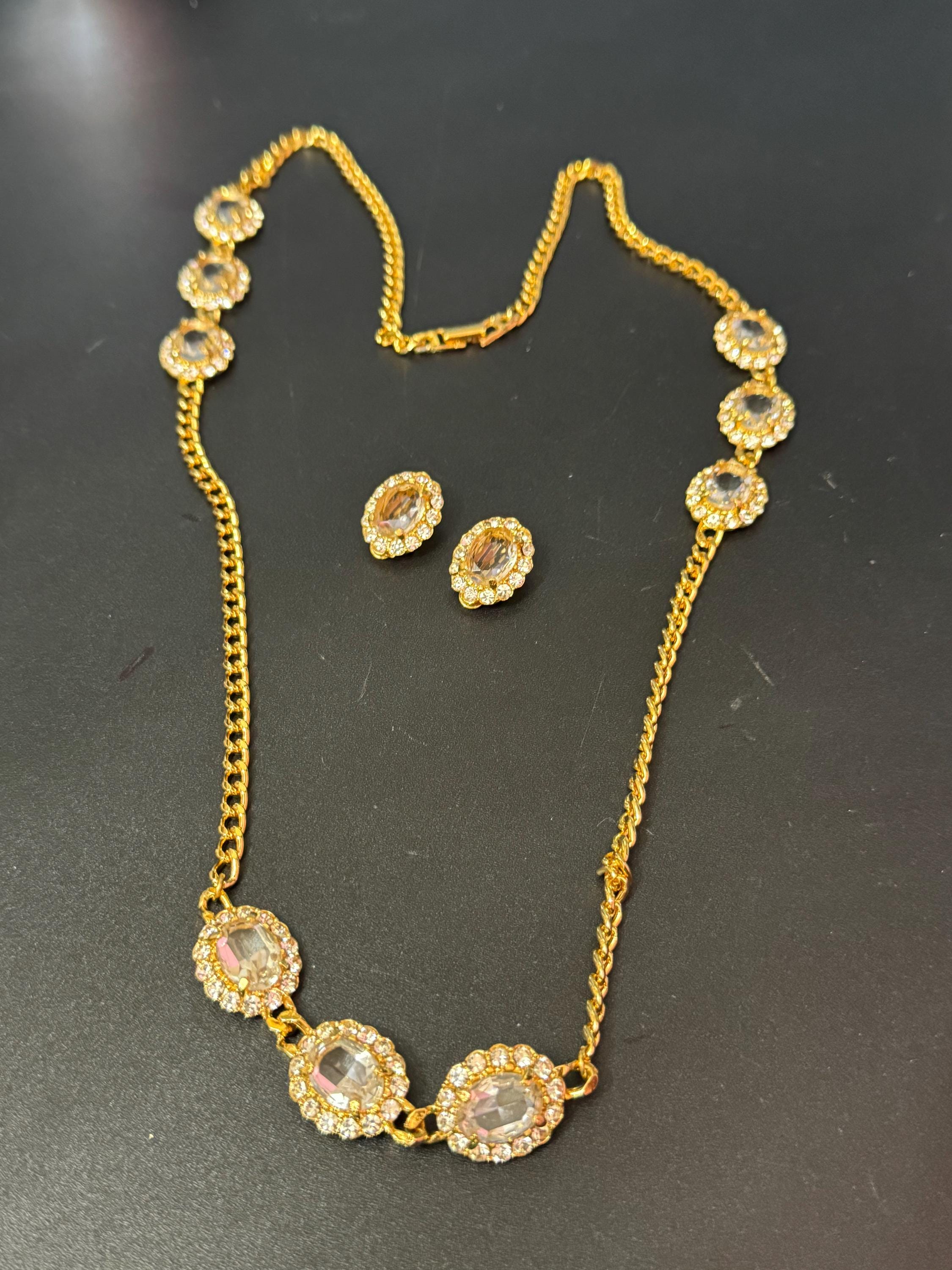 Vintage genuine clear Swarovski crystal long gold tone chain station necklace with oval rhinestones 84cm and 23mm oval clip on earrings