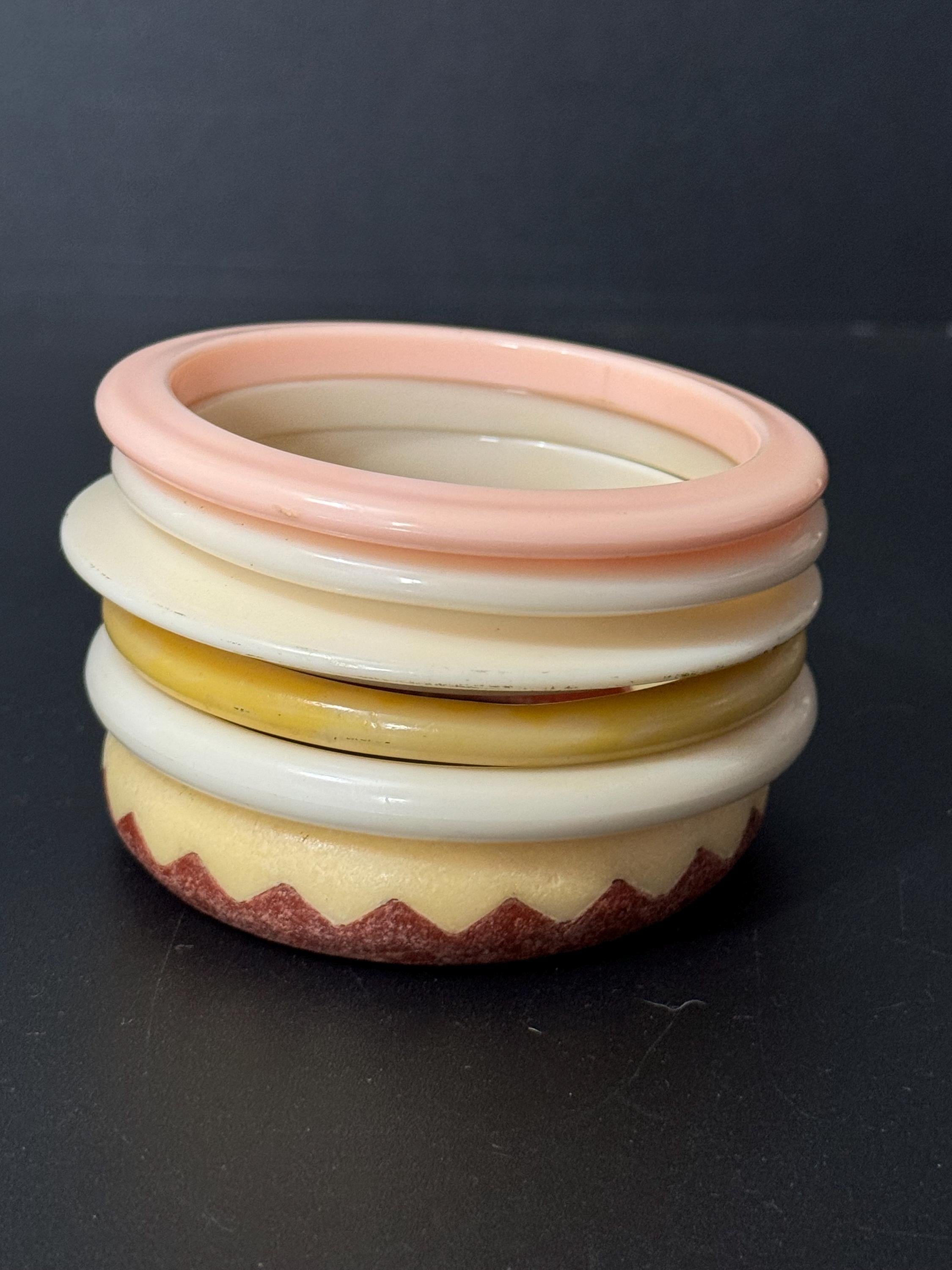 Cream pink brown beige stack of vintage retro plastic bangles