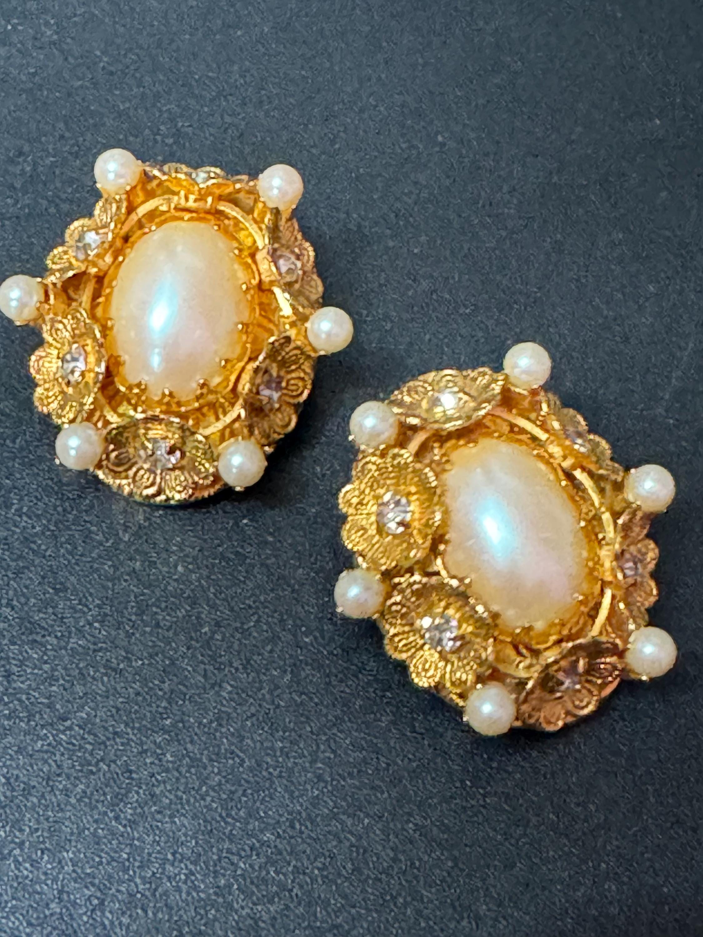 Oversized oval rhinestone and faux Pearl cabochon floral gold tone clip on earrings