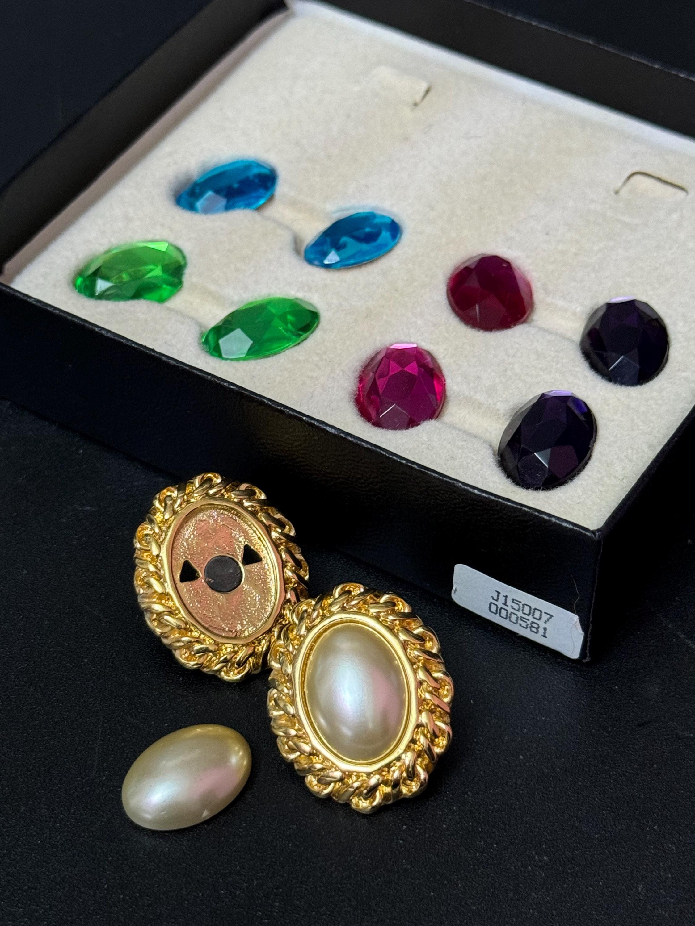 Signed KJL boxed set of interchangeable oval cabochon stud pierced earrings Kenneth lane