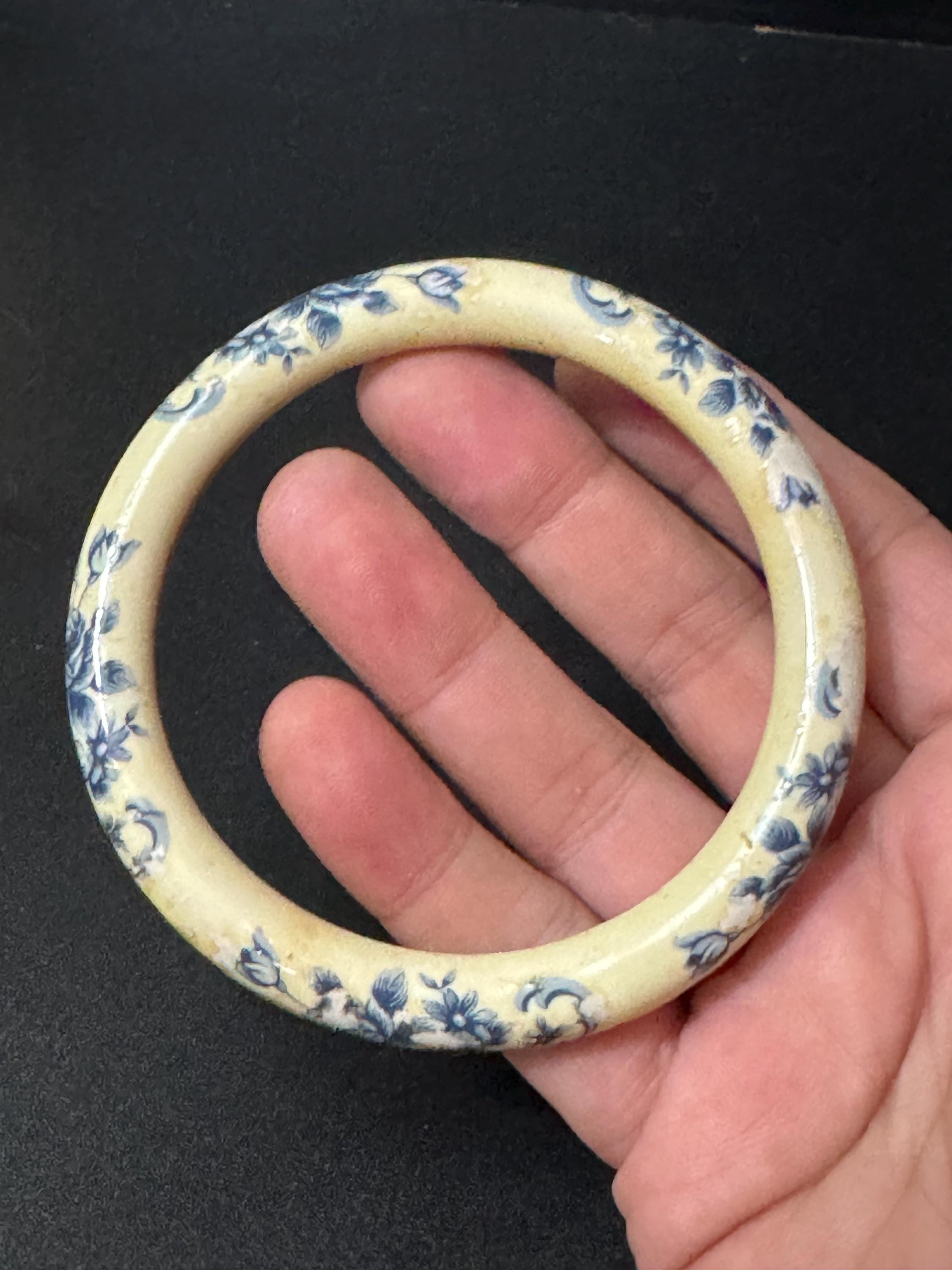 Antique ceramic Art Deco Period Cream bangle bracelet transfer printed with blue floral roses