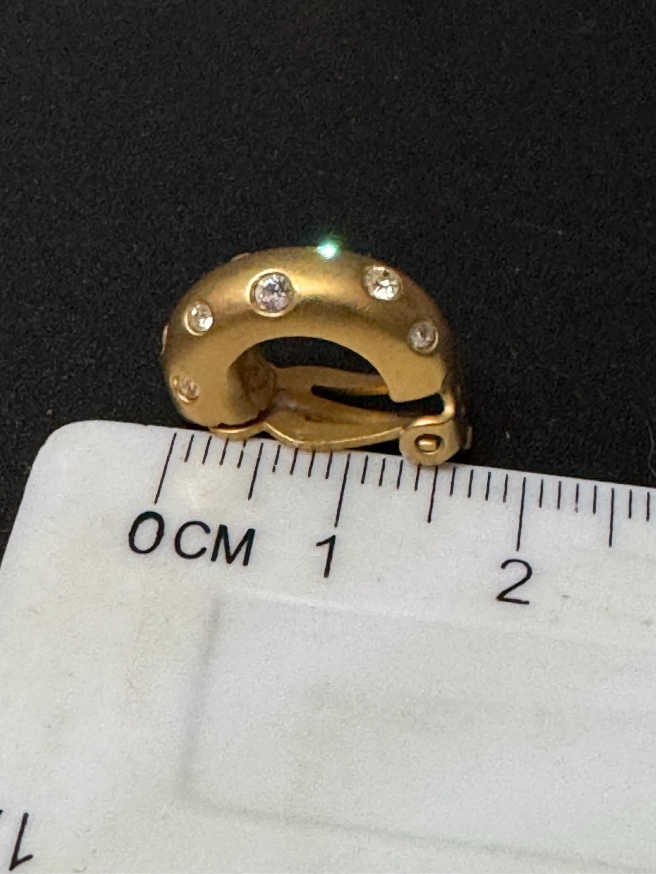 Signed Swarovski Matt gold tone clear crystal diamanté half hoop clip on earrings