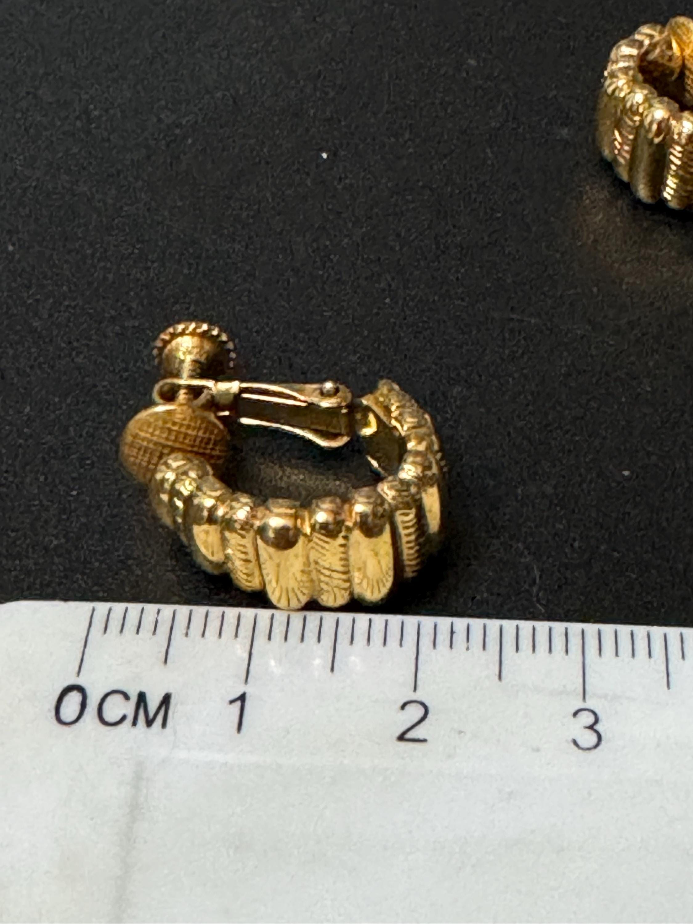 Signed NAPIER Vintage small gold tone clip on hoop earrings