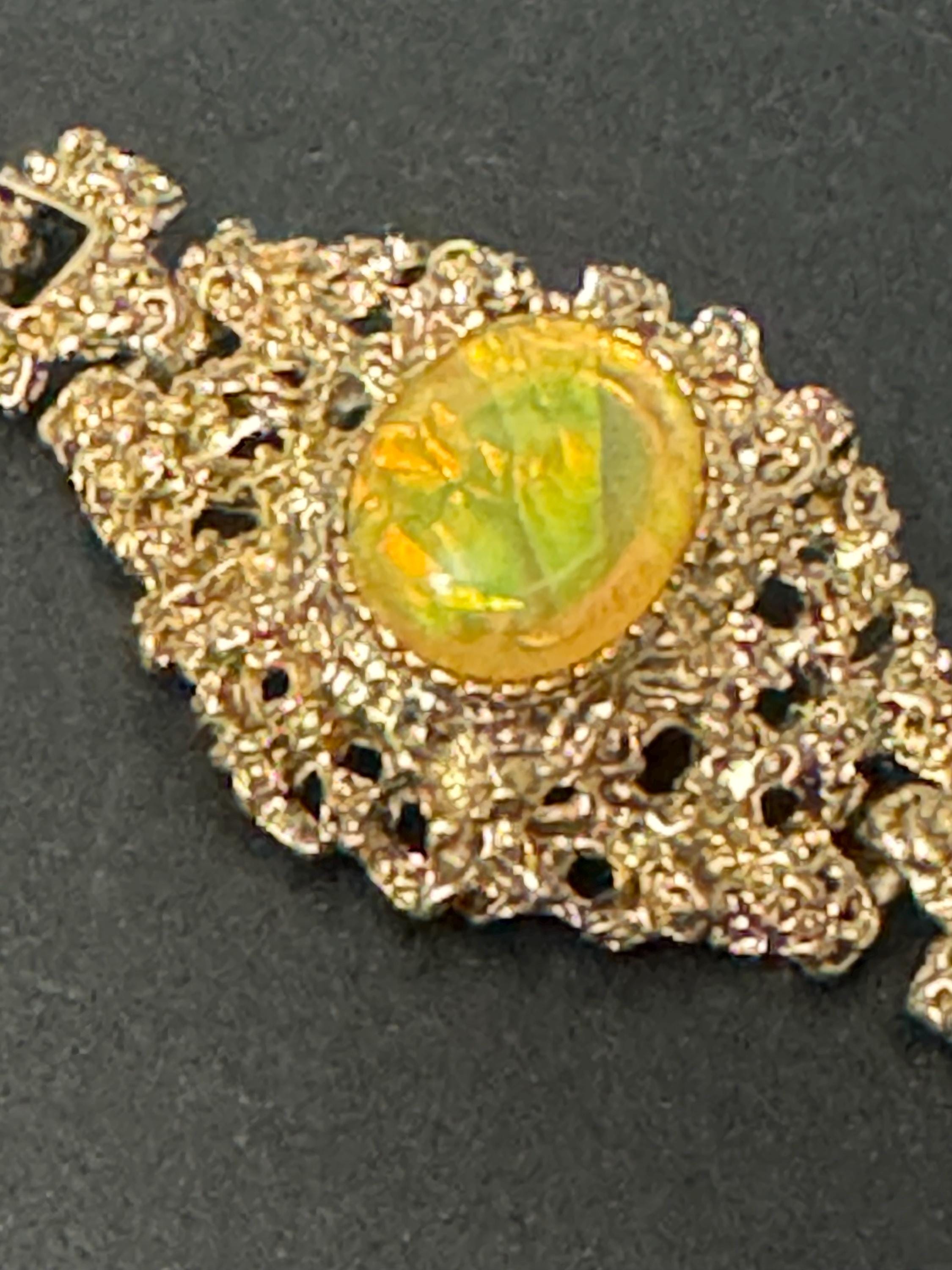 Brutalist gold tone oval orange green Rainbow cabochon textured bracelet 1970s modernist