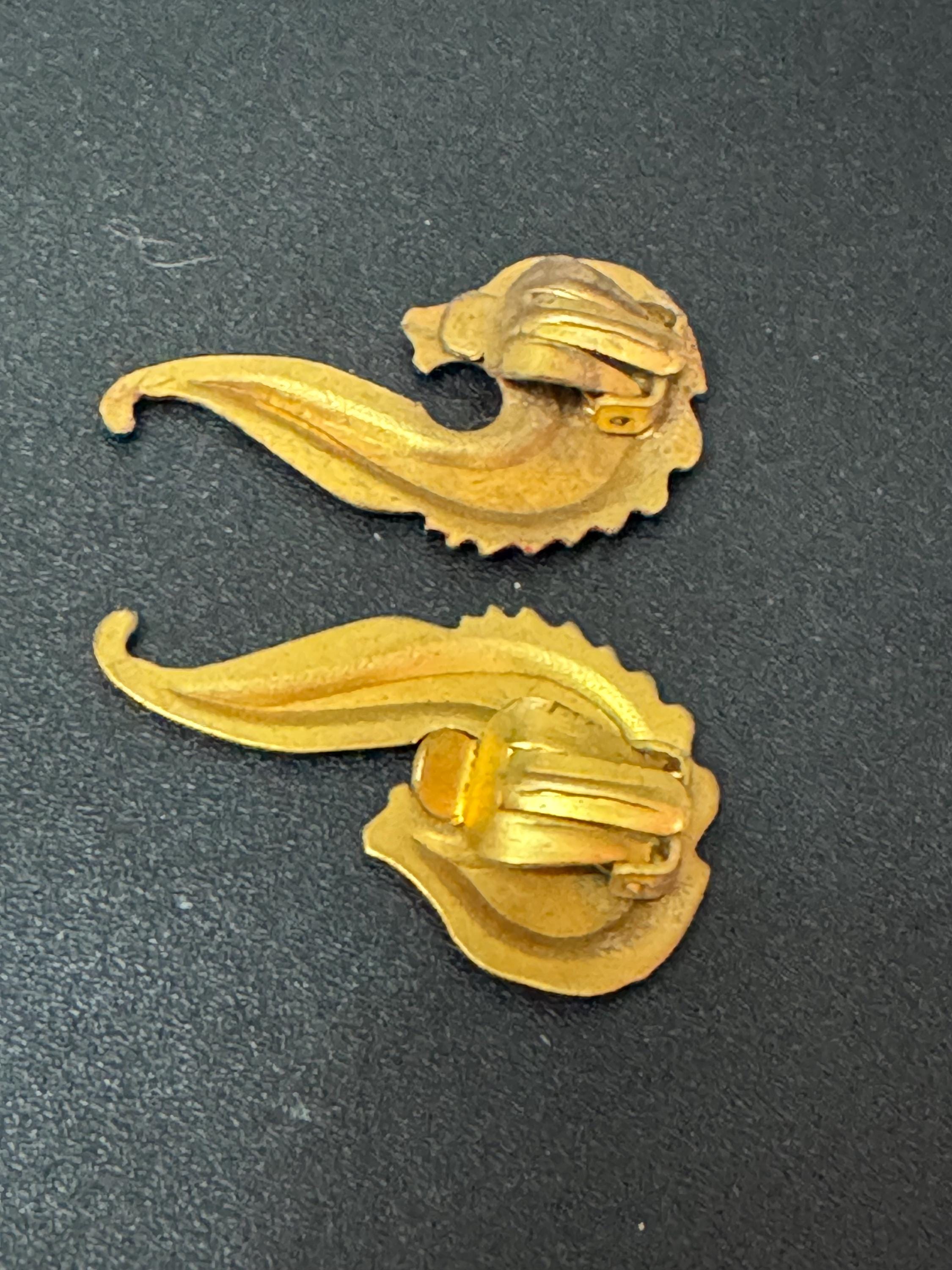 Antique Art Deco 1920s brass and red enamel clip on earrings paisley design