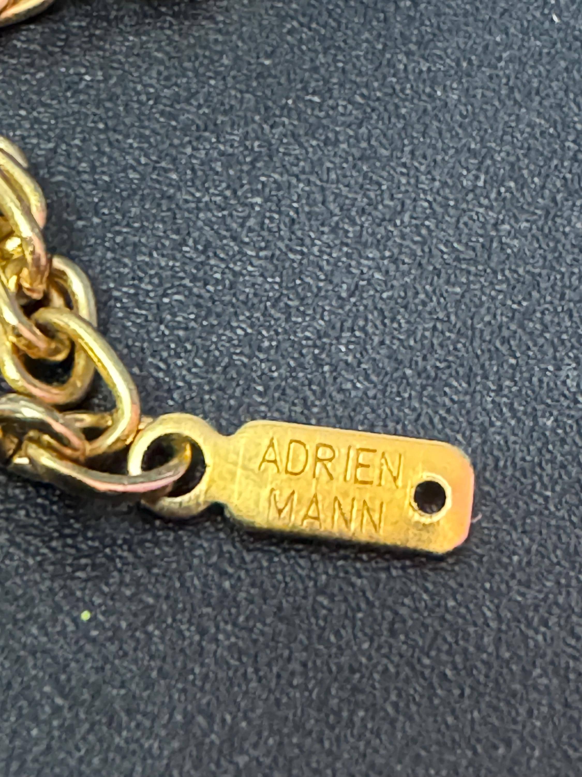 retro oval purple amethyst fob pendant on a 60cm gold tone ADRIEN Mann signed chain