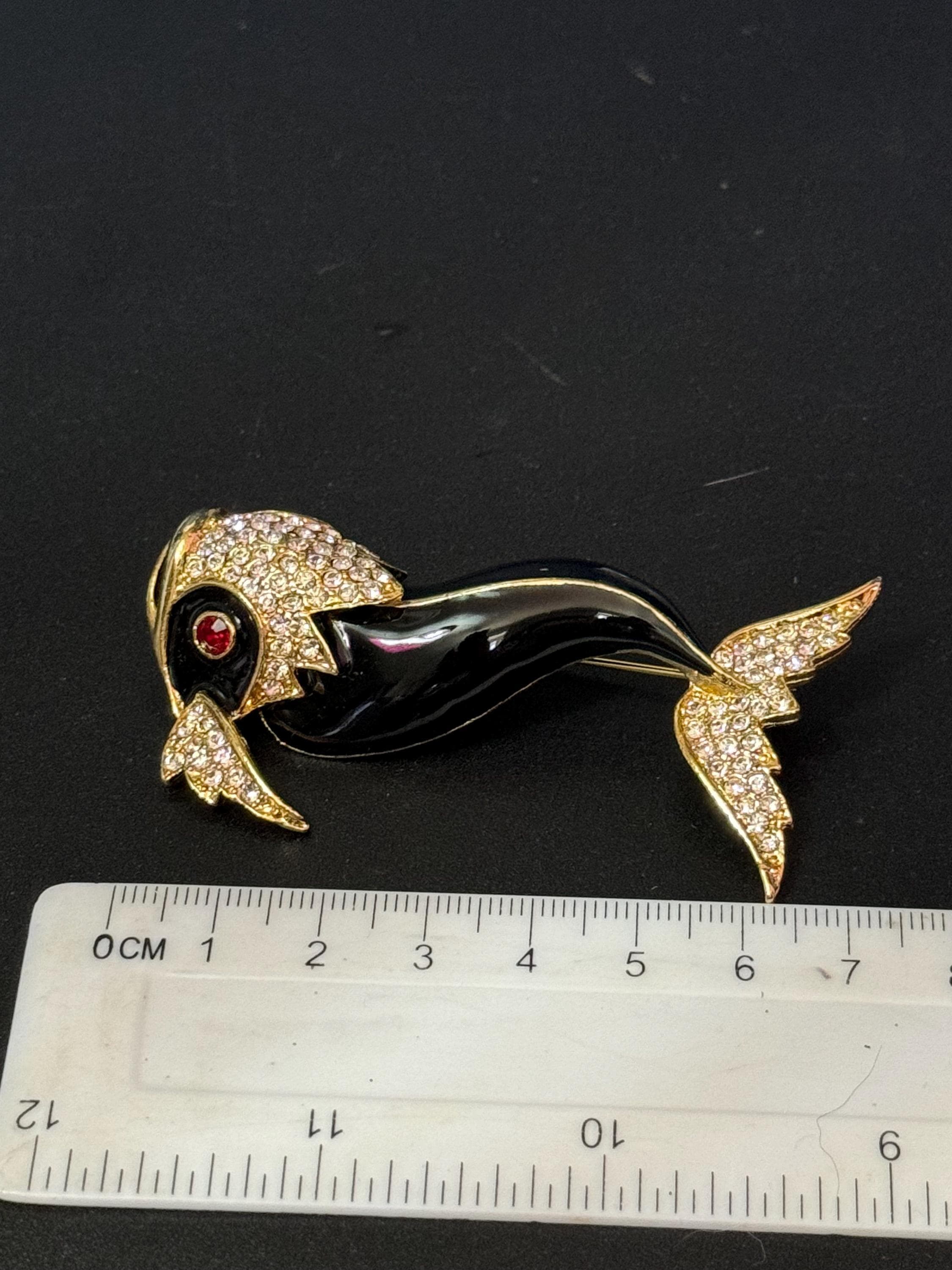 Vintage 1980s Gold tone Black enamel  fish brooch with ruby glass eyes 8cm