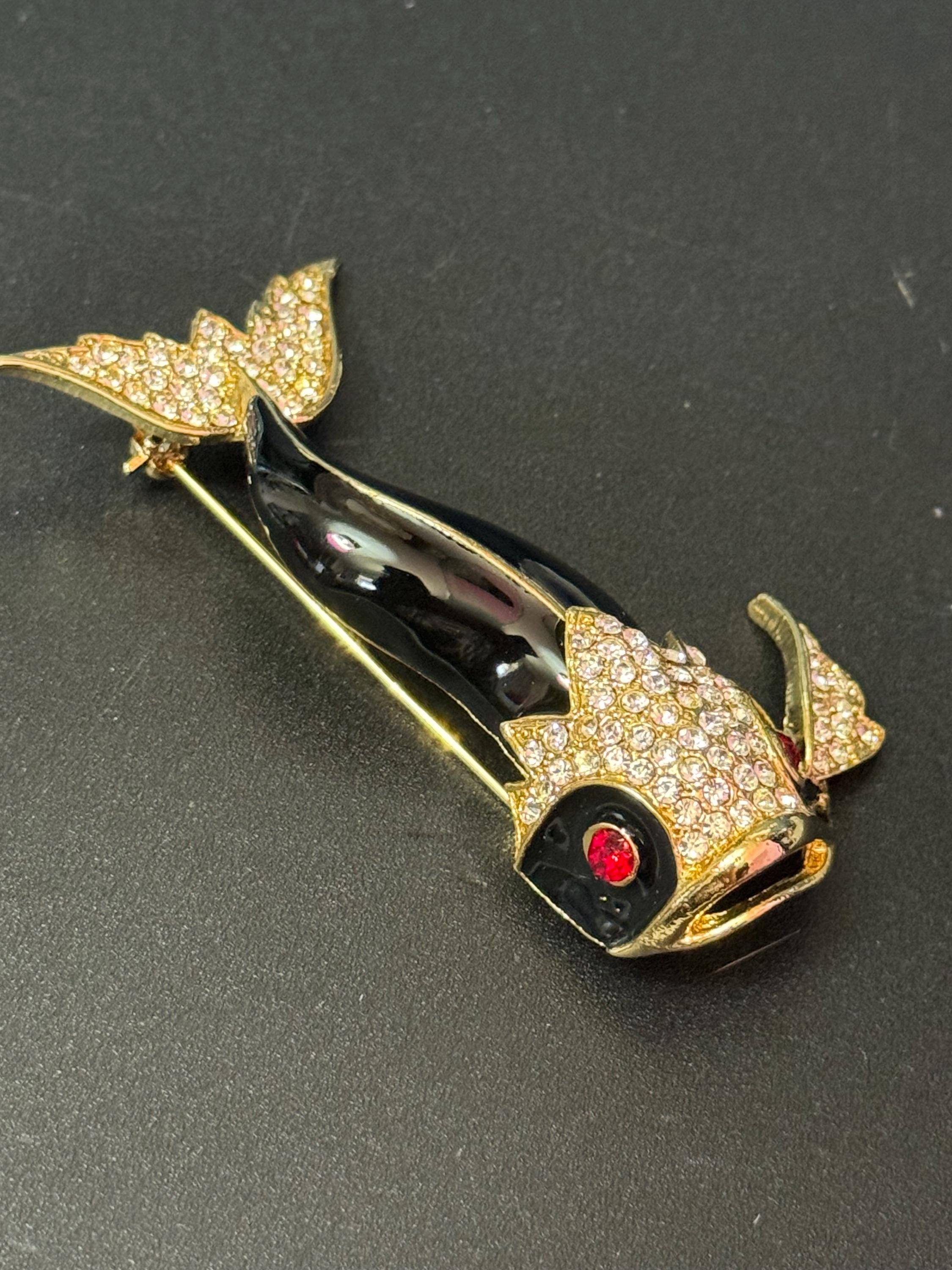 Vintage 1980s Gold tone Black enamel  fish brooch with ruby glass eyes 8cm