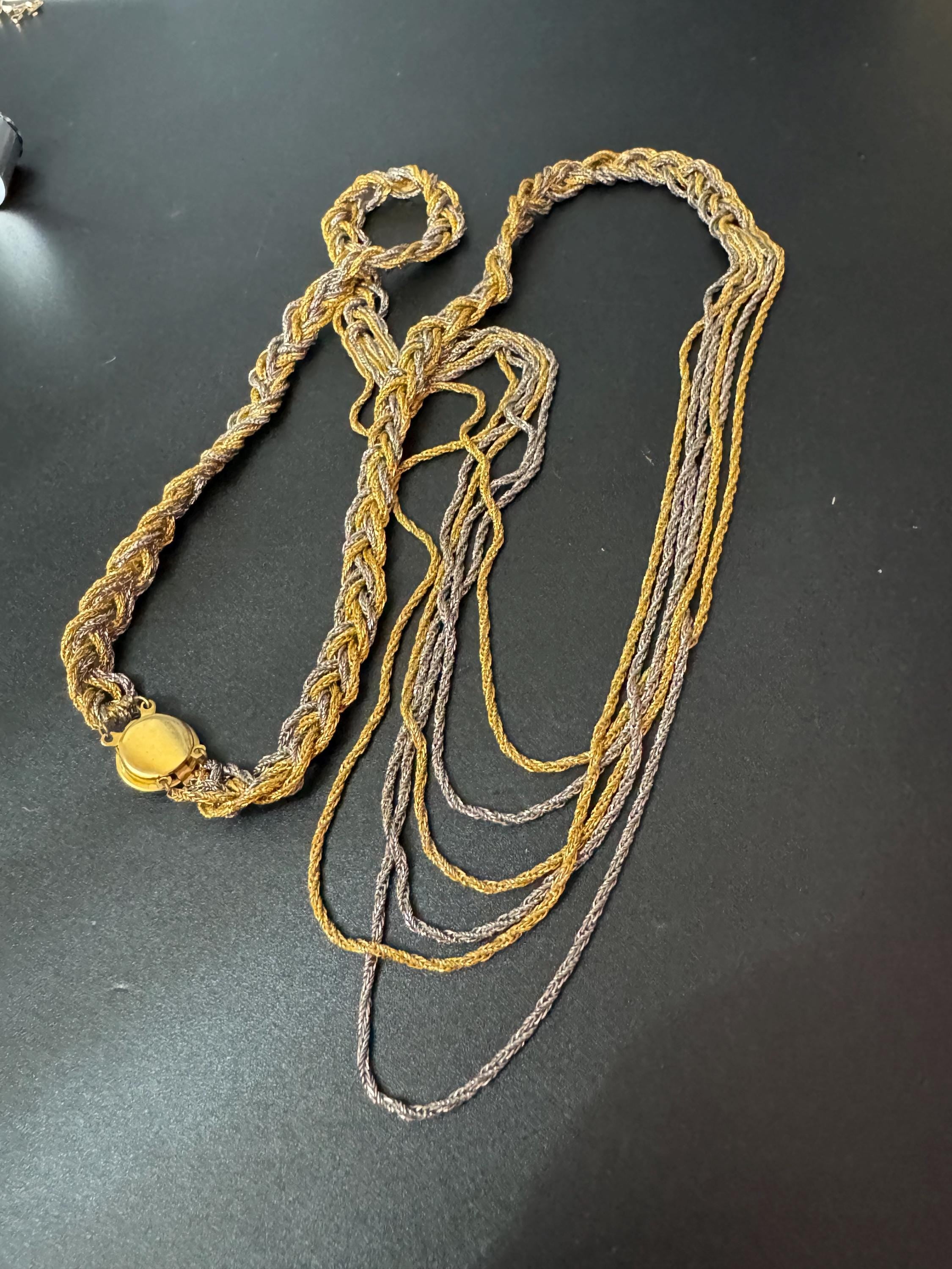 Vintage 1970s gold and silver tone multi strand rope chain link necklace