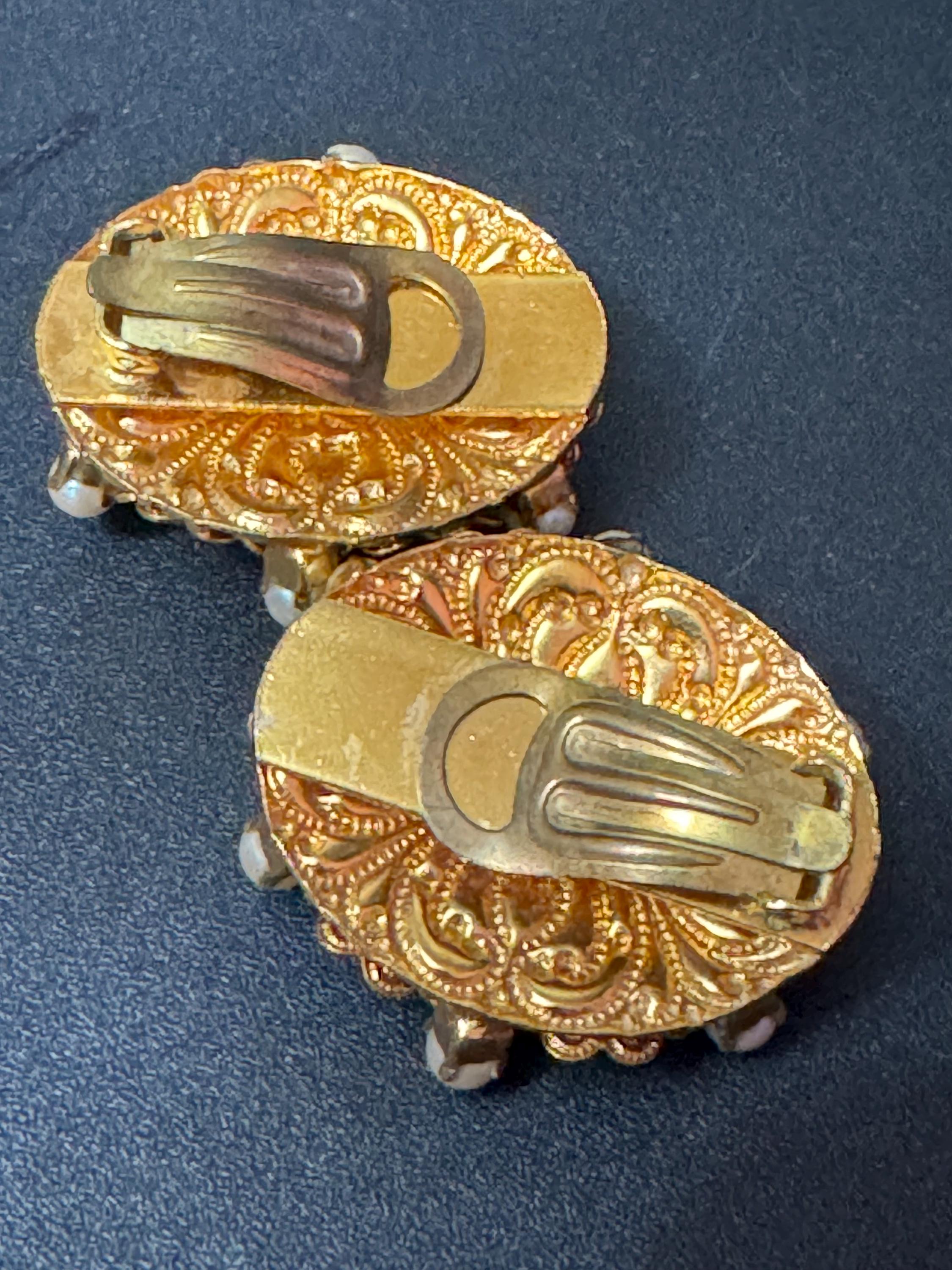 Oversized oval rhinestone and faux Pearl cabochon floral gold tone clip on earrings