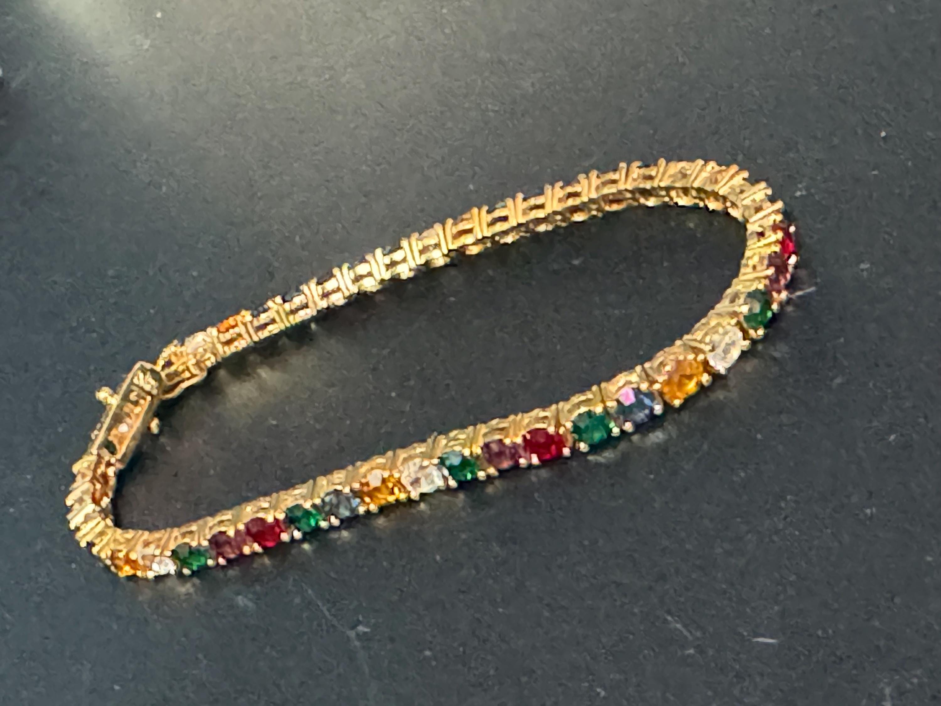 Signed Joan rivers gold plated multi coloured rainbow rhinestone tennis bracelet