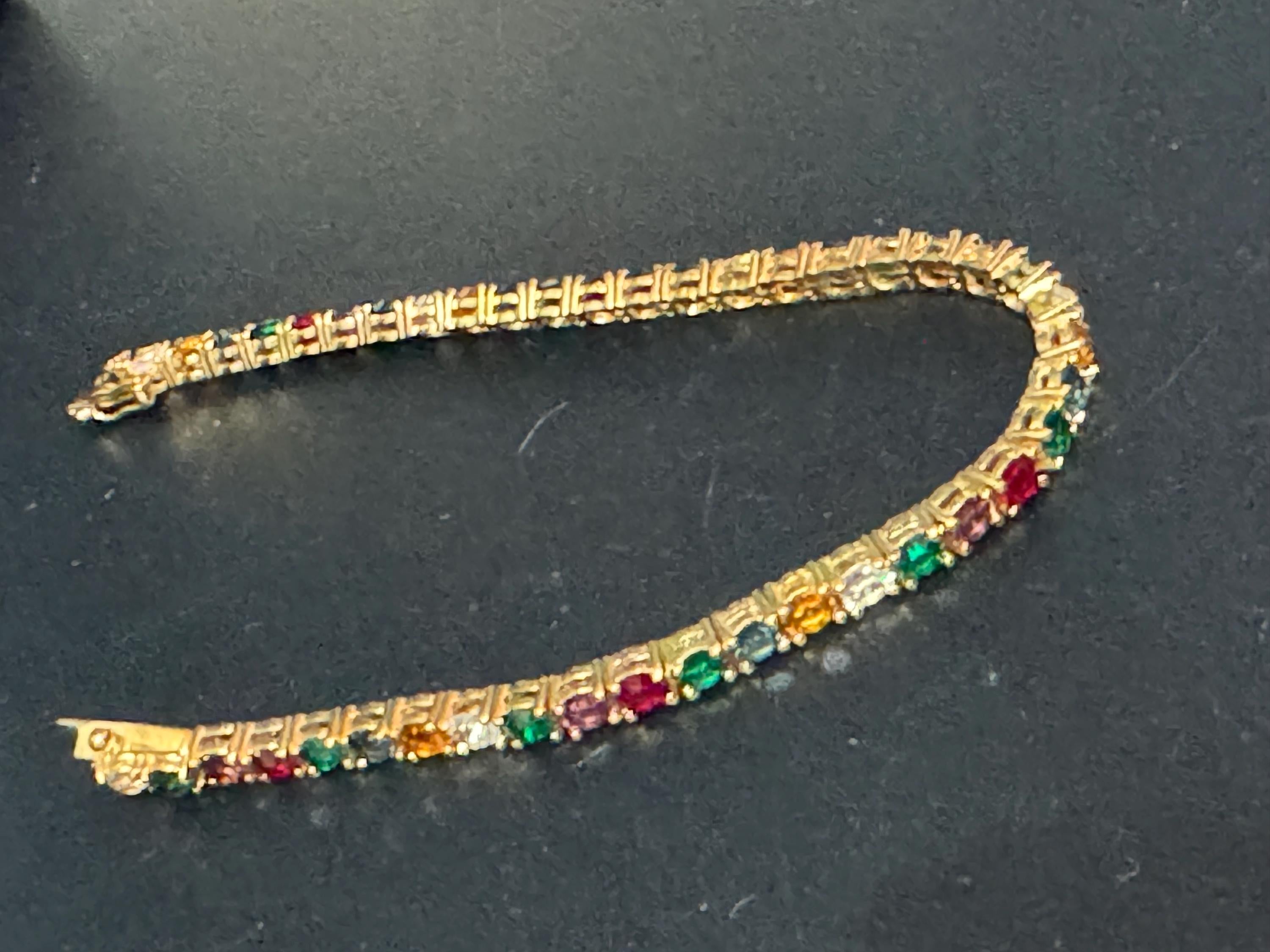 Signed Joan rivers gold plated multi coloured rainbow rhinestone tennis bracelet