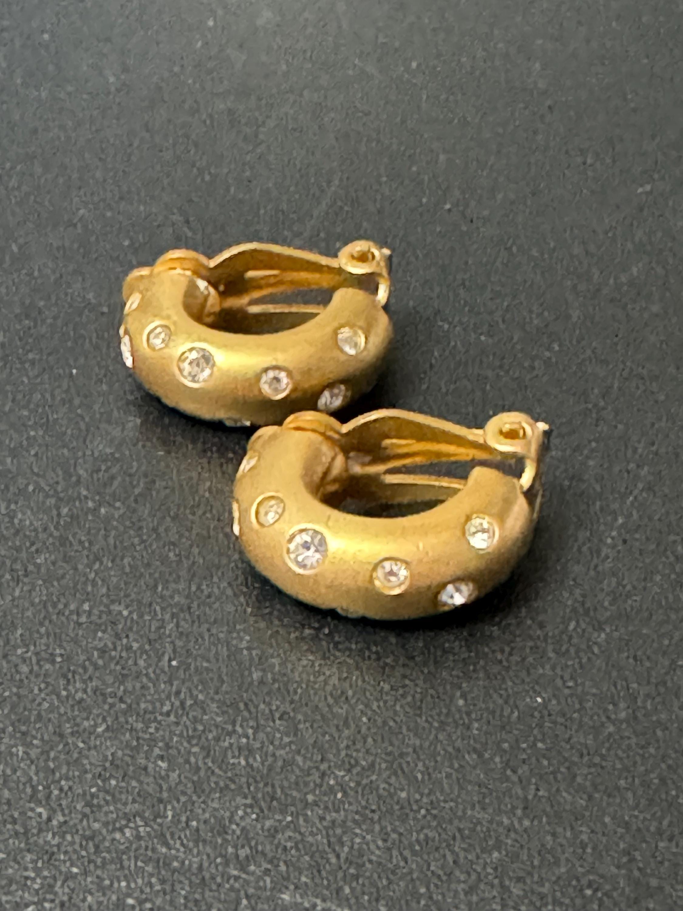 Signed Swarovski Matt gold tone clear crystal diamanté half hoop clip on earrings