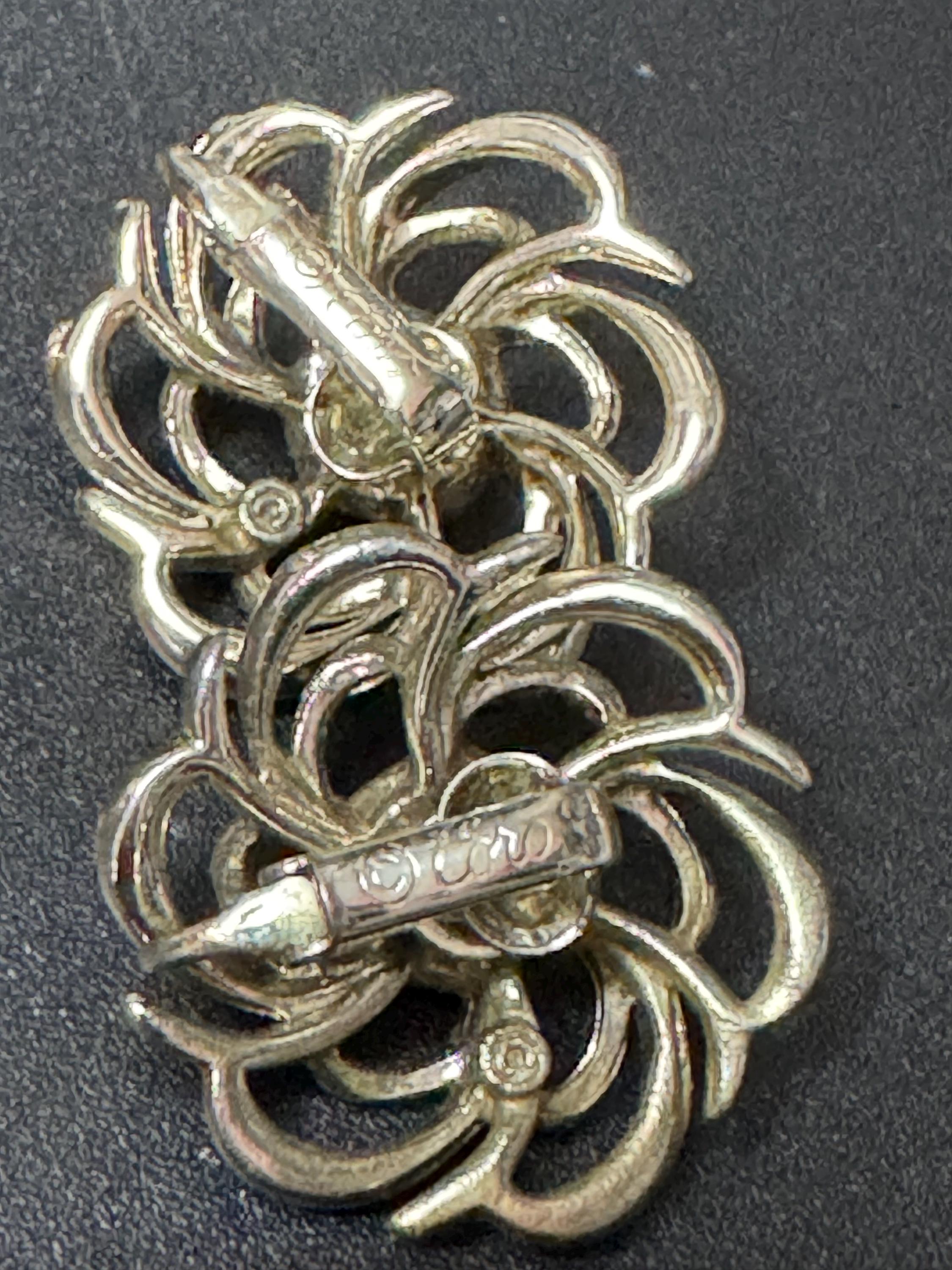 Signed coro Corocraft Vintage Gold tone floral Clip on earrings mid century