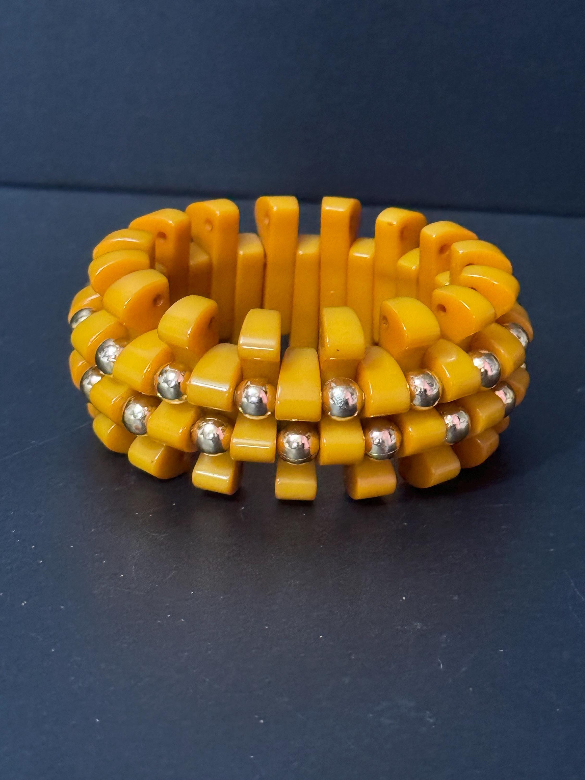 Art Deco Early Plastic Yellow bakelite wide stretch cuff bangle bracelet with gold beads Vintage