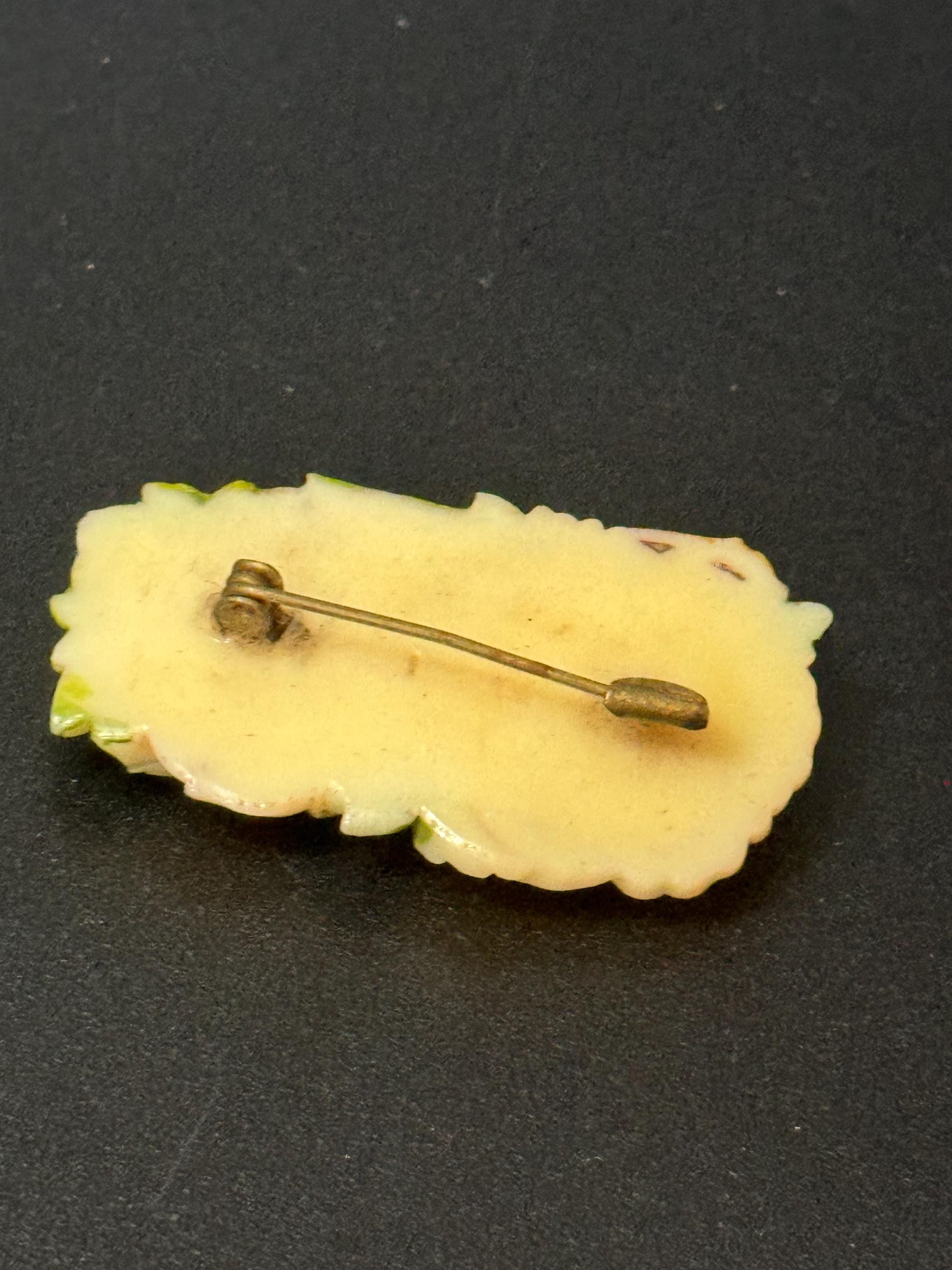 Early Plastic Celluloid Art Deco cream green floral rectangular carved flower brooch