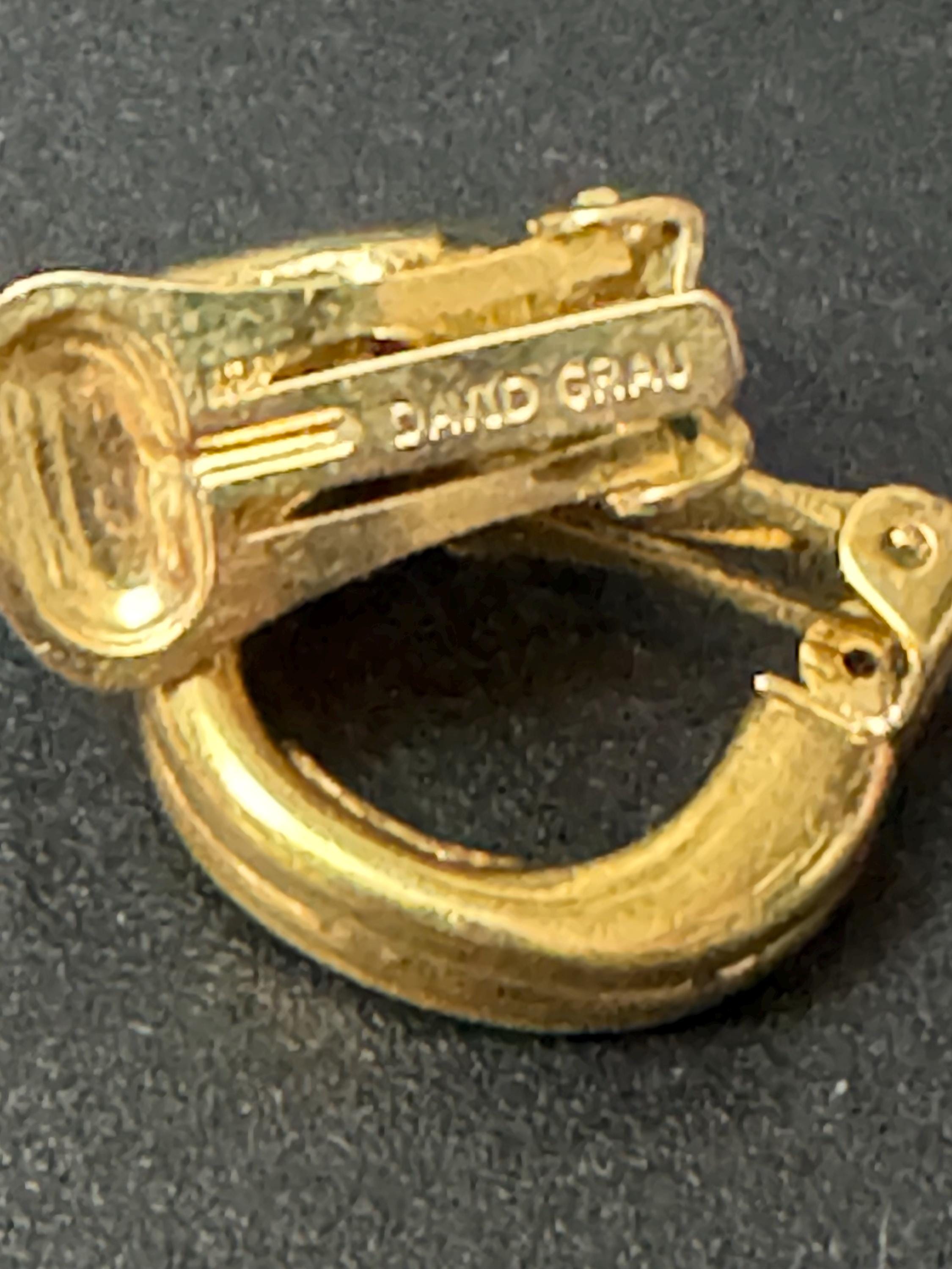 Signed David Grau gold tone half hoop clip on earrings, designer