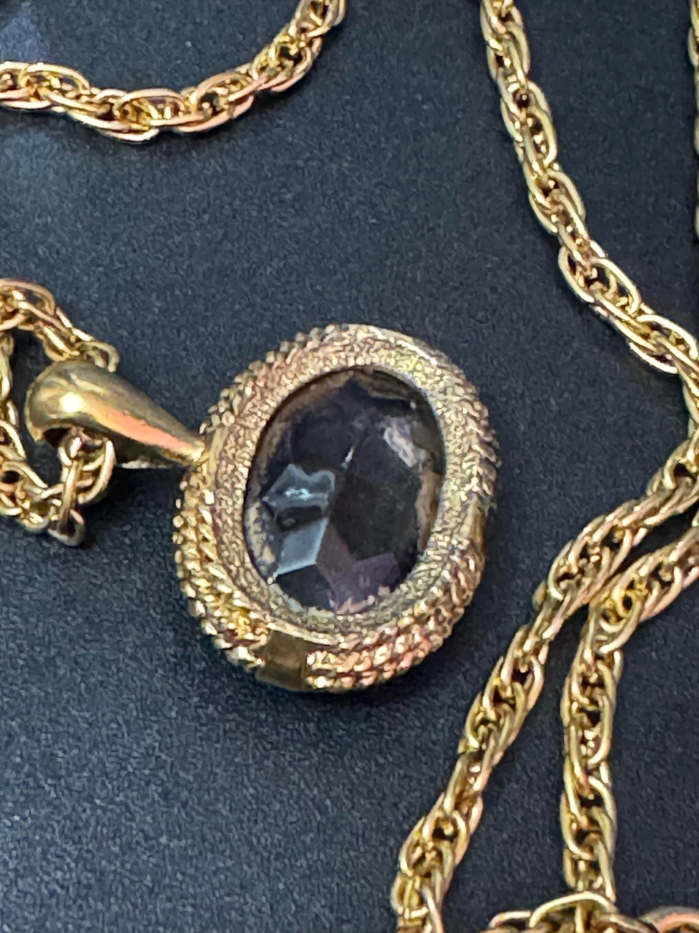 retro oval purple amethyst fob pendant on a 60cm gold tone ADRIEN Mann signed chain