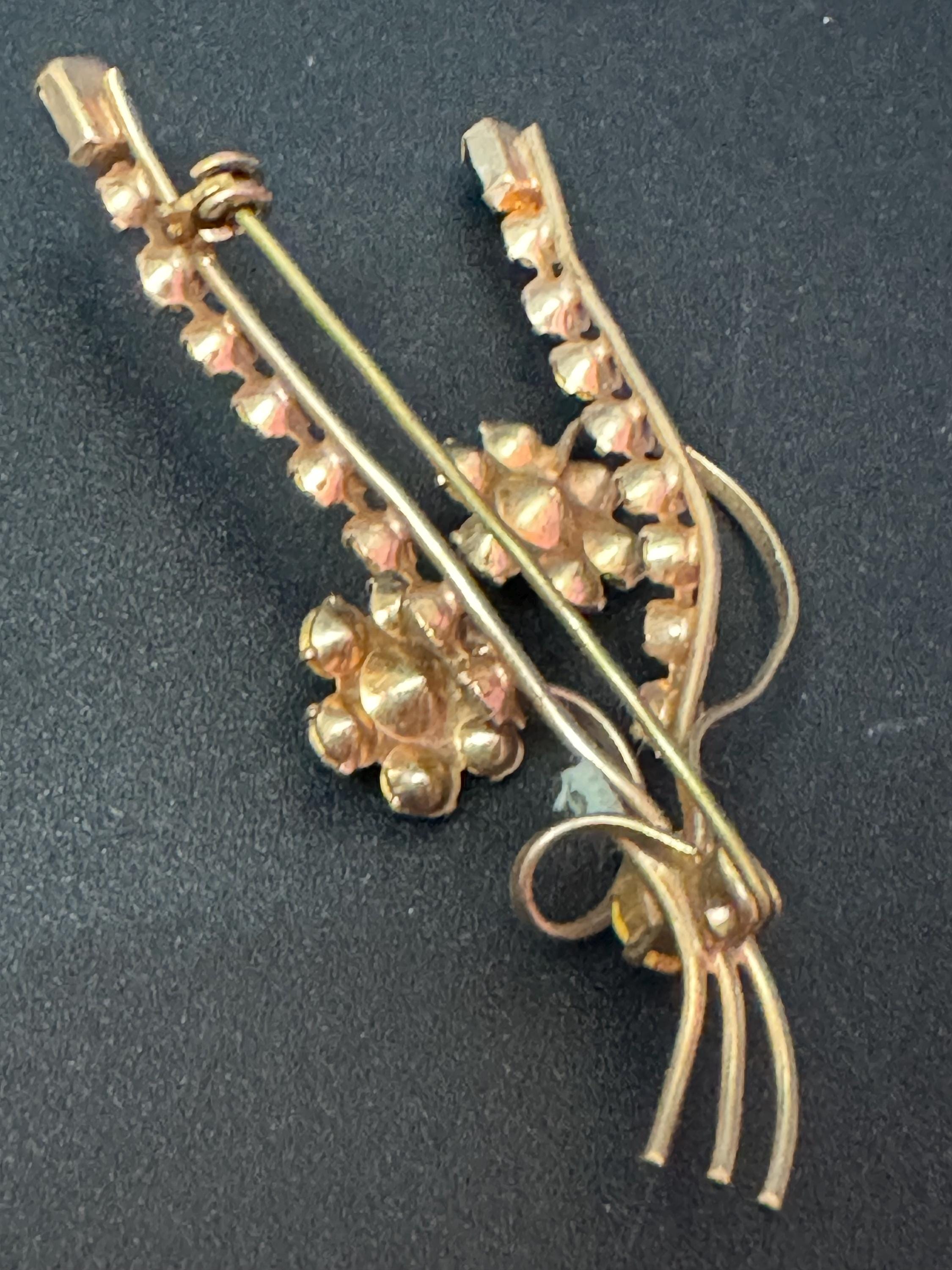 Vintage MCM gold tone clear and emerald green rhinestone paste floral brooch 1950s 1960s