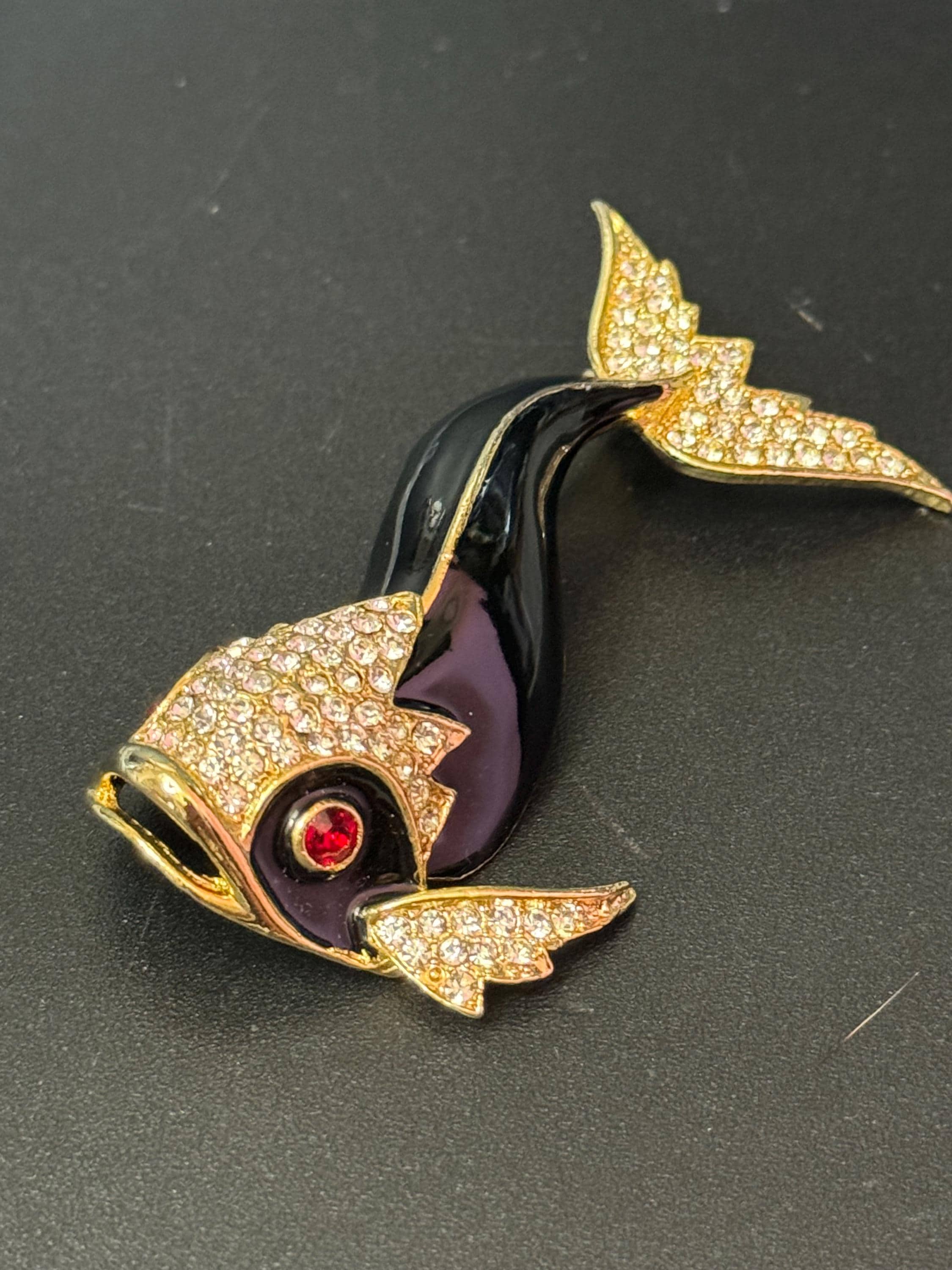 Vintage 1980s Gold tone Black enamel  fish brooch with ruby glass eyes 8cm