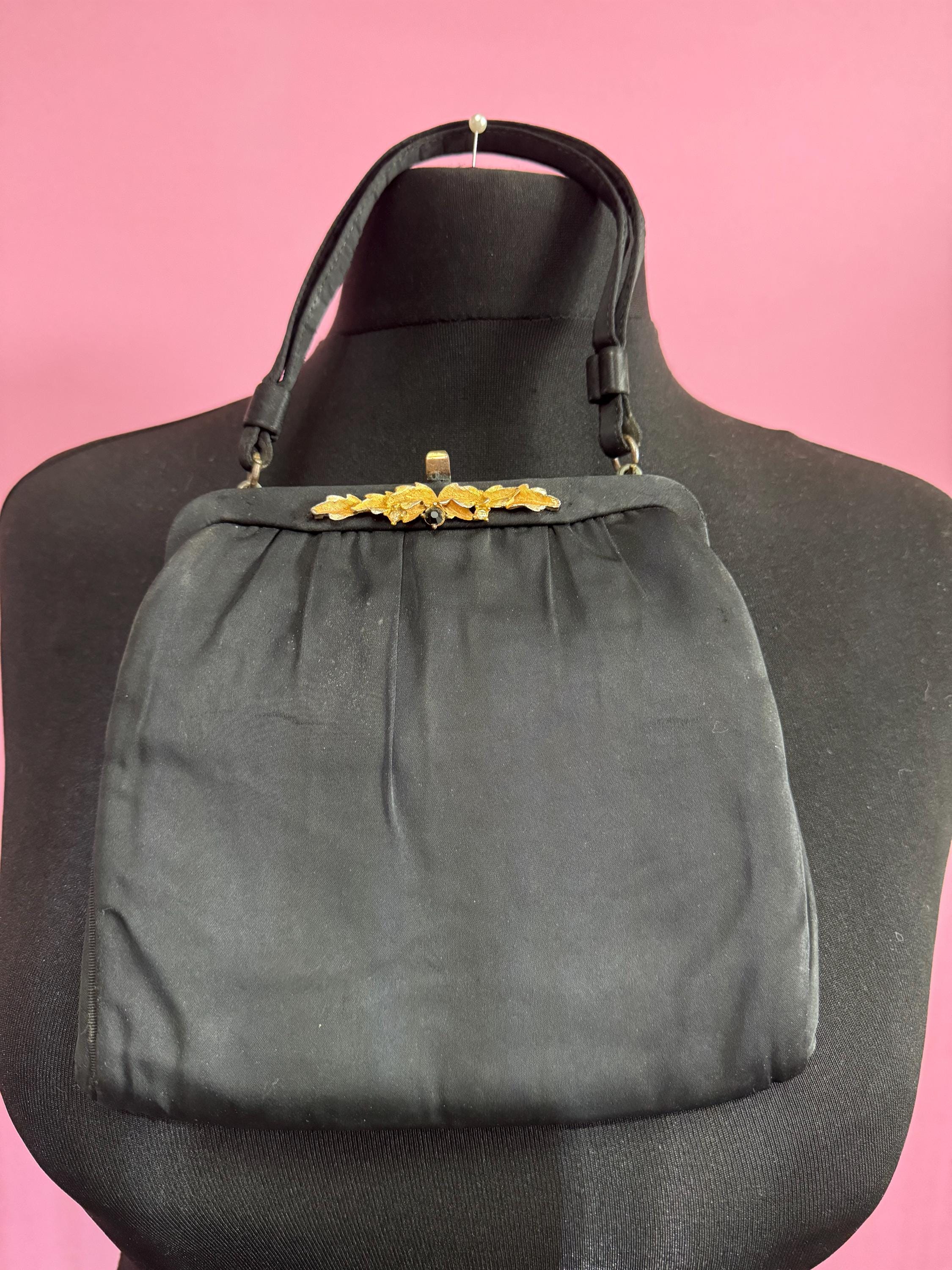 Vintage little black satin evening purse with ornate brass detail and clasp art deco