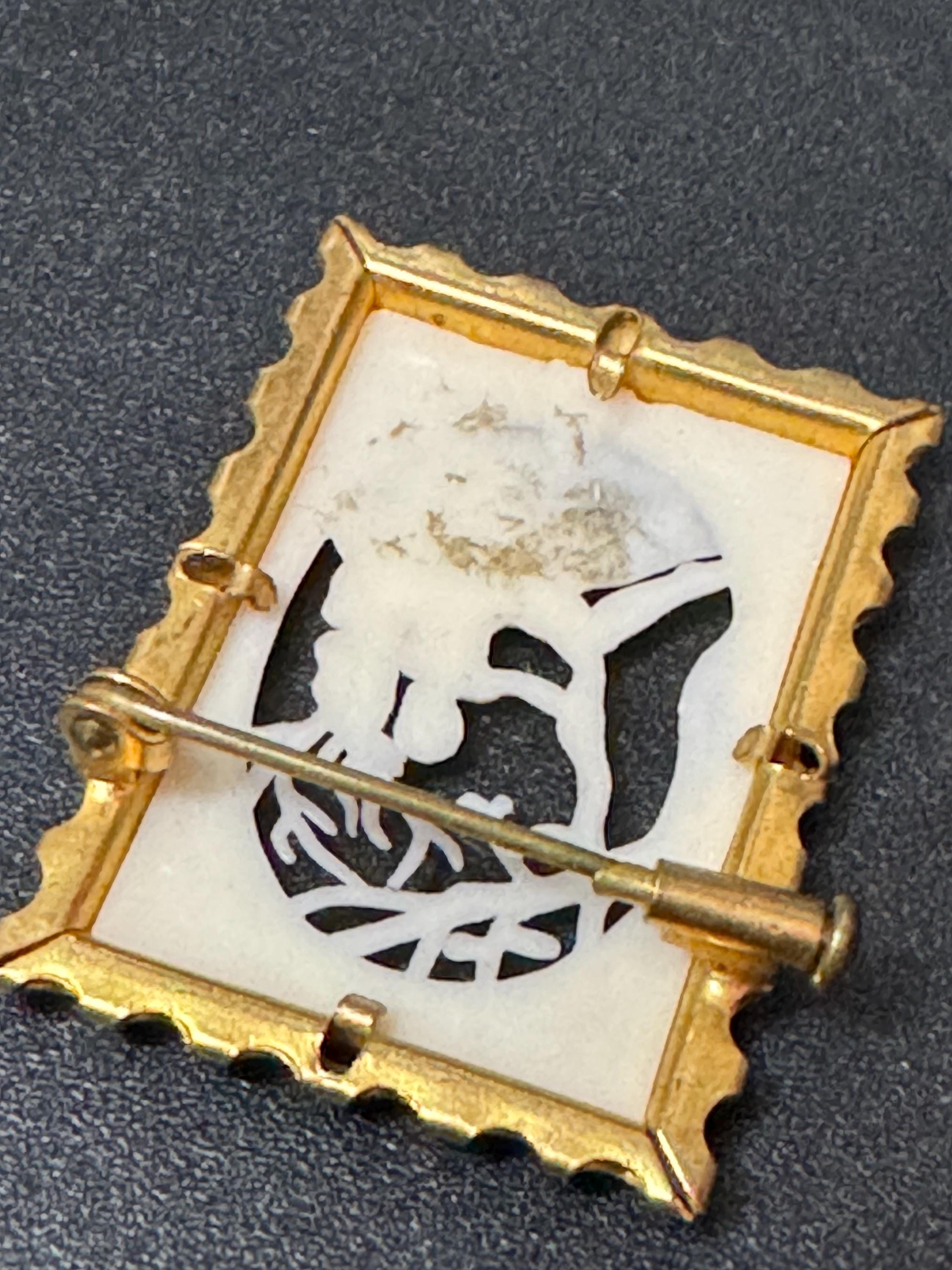 Vintage 1930s couple Scene Brooch: Brass Framed Plastic Openwork