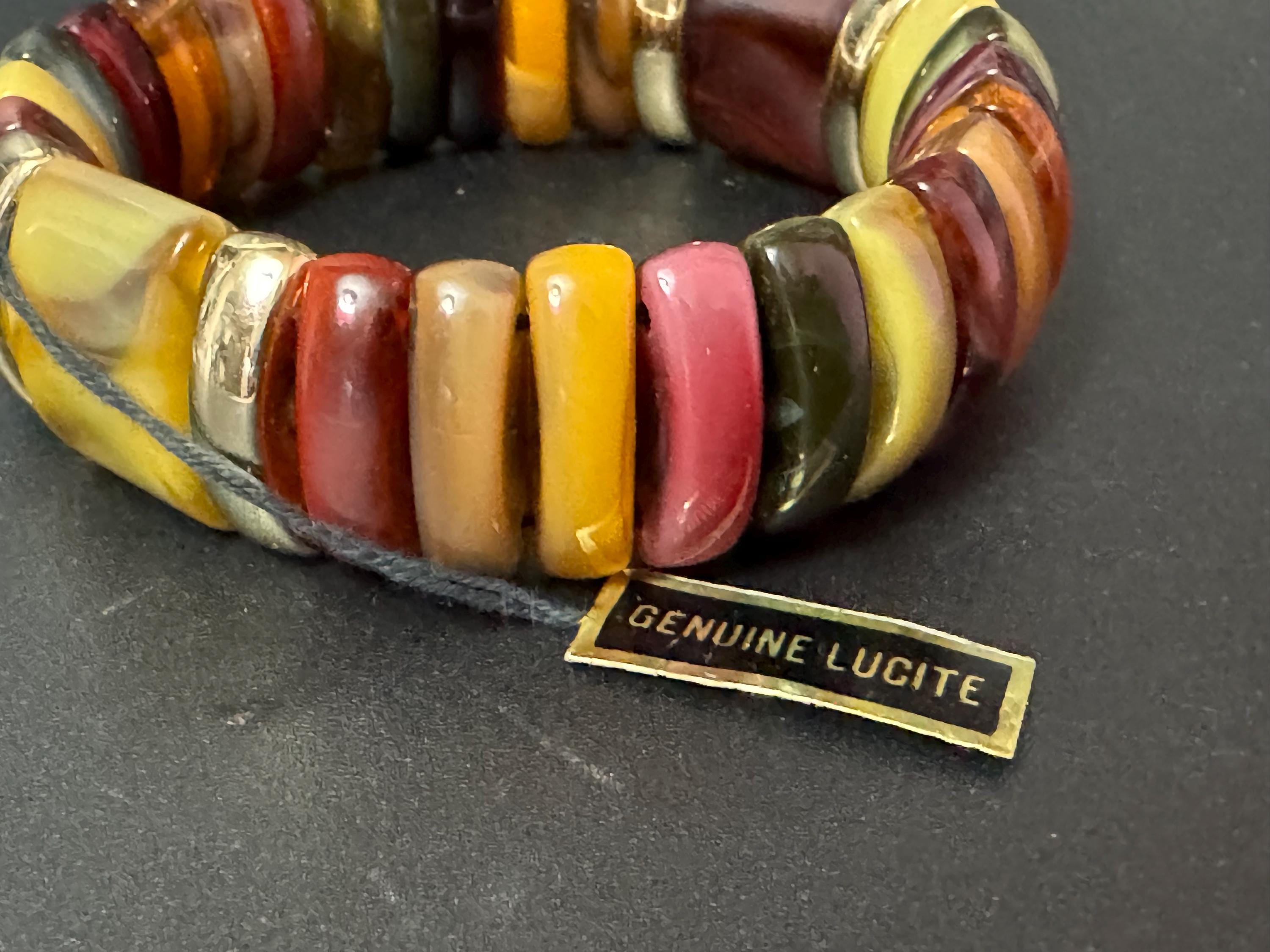 Vintage genuine Lucite early plastic beaded brown orange green wide stretch bracelet Vintage 60’s 70s