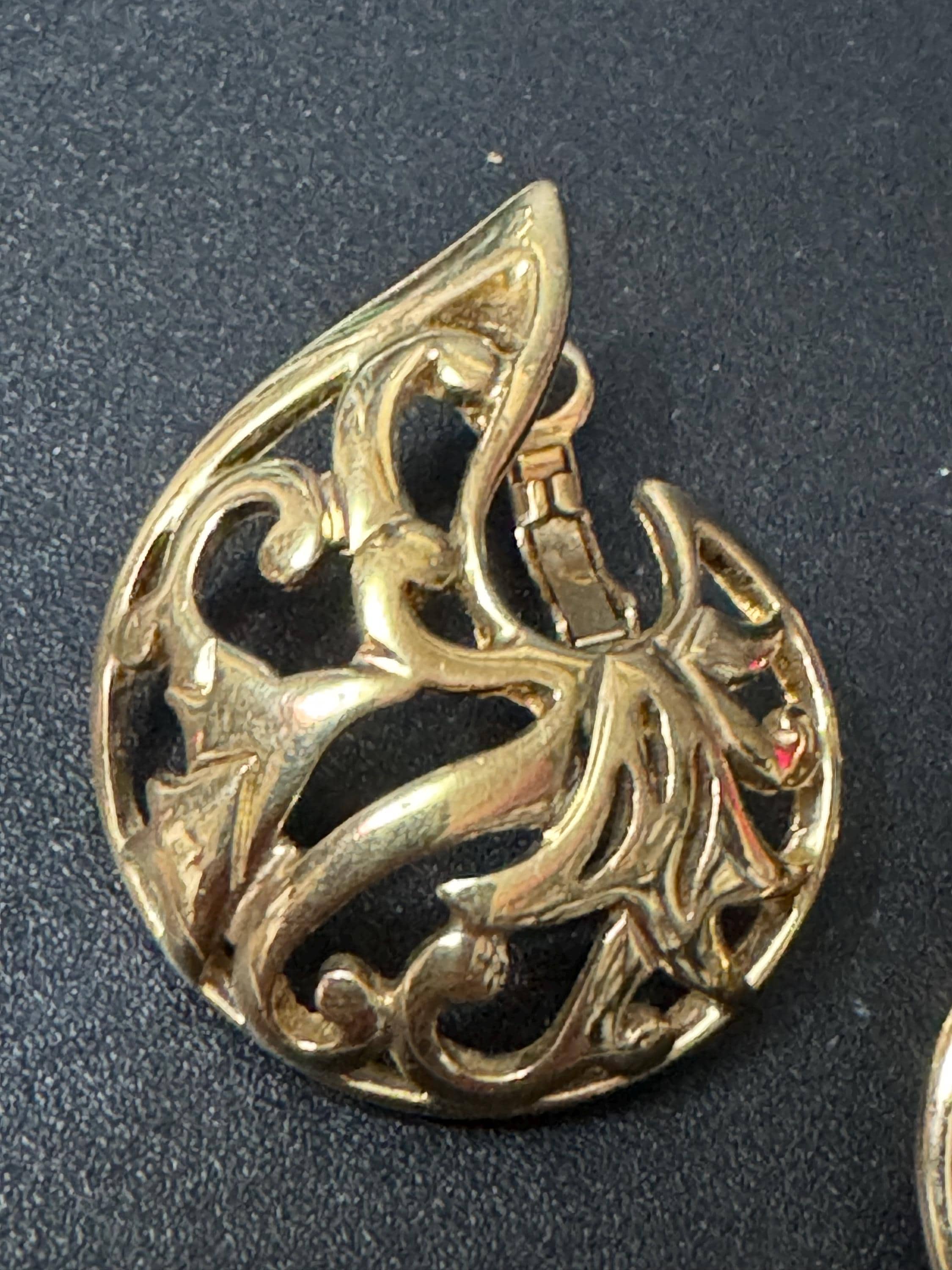 signed PL Pierre Lang designer oversized Gold Tone open work swirl clip on earrings
