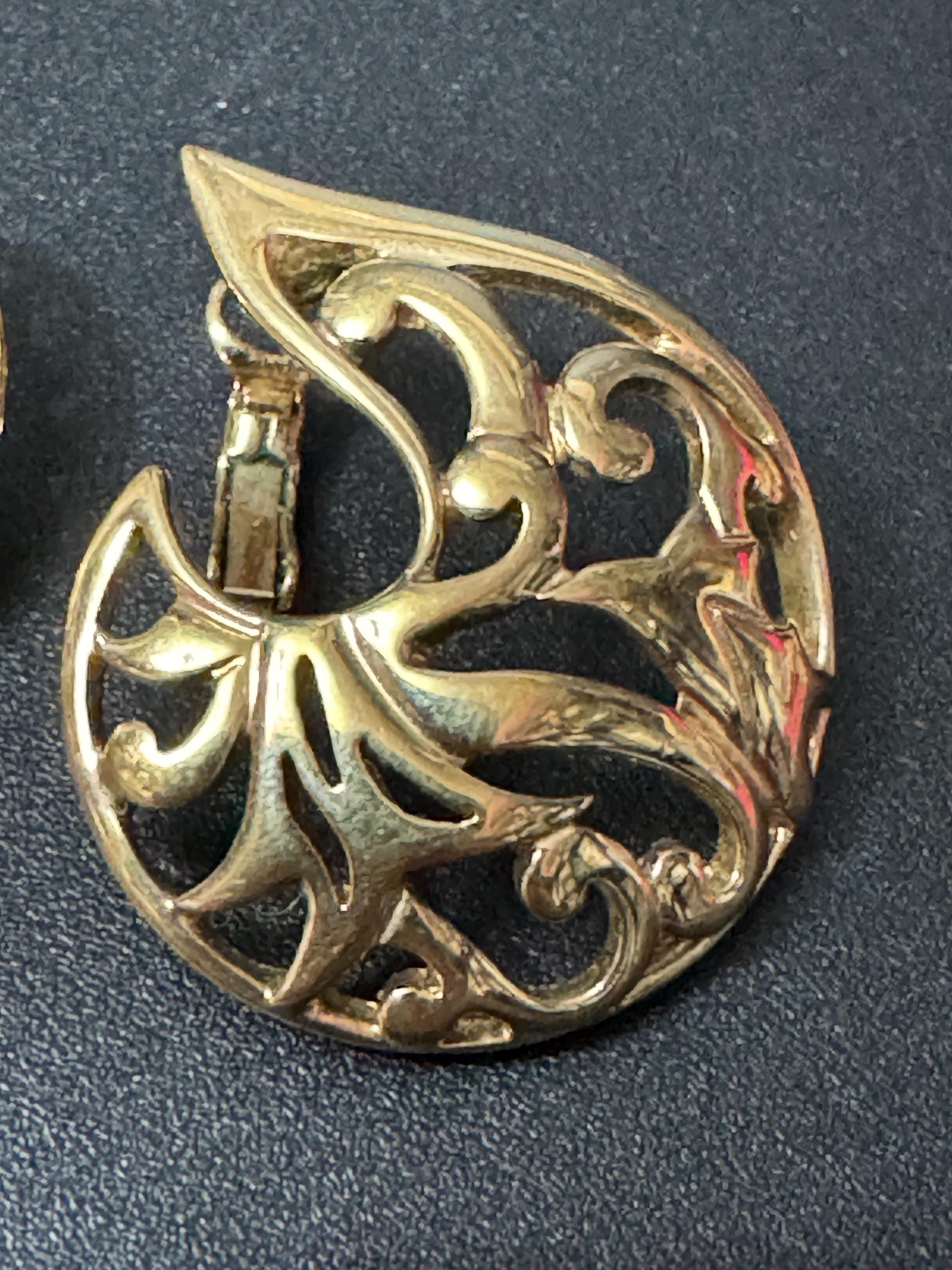 signed PL Pierre Lang designer oversized Gold Tone open work swirl clip on earrings