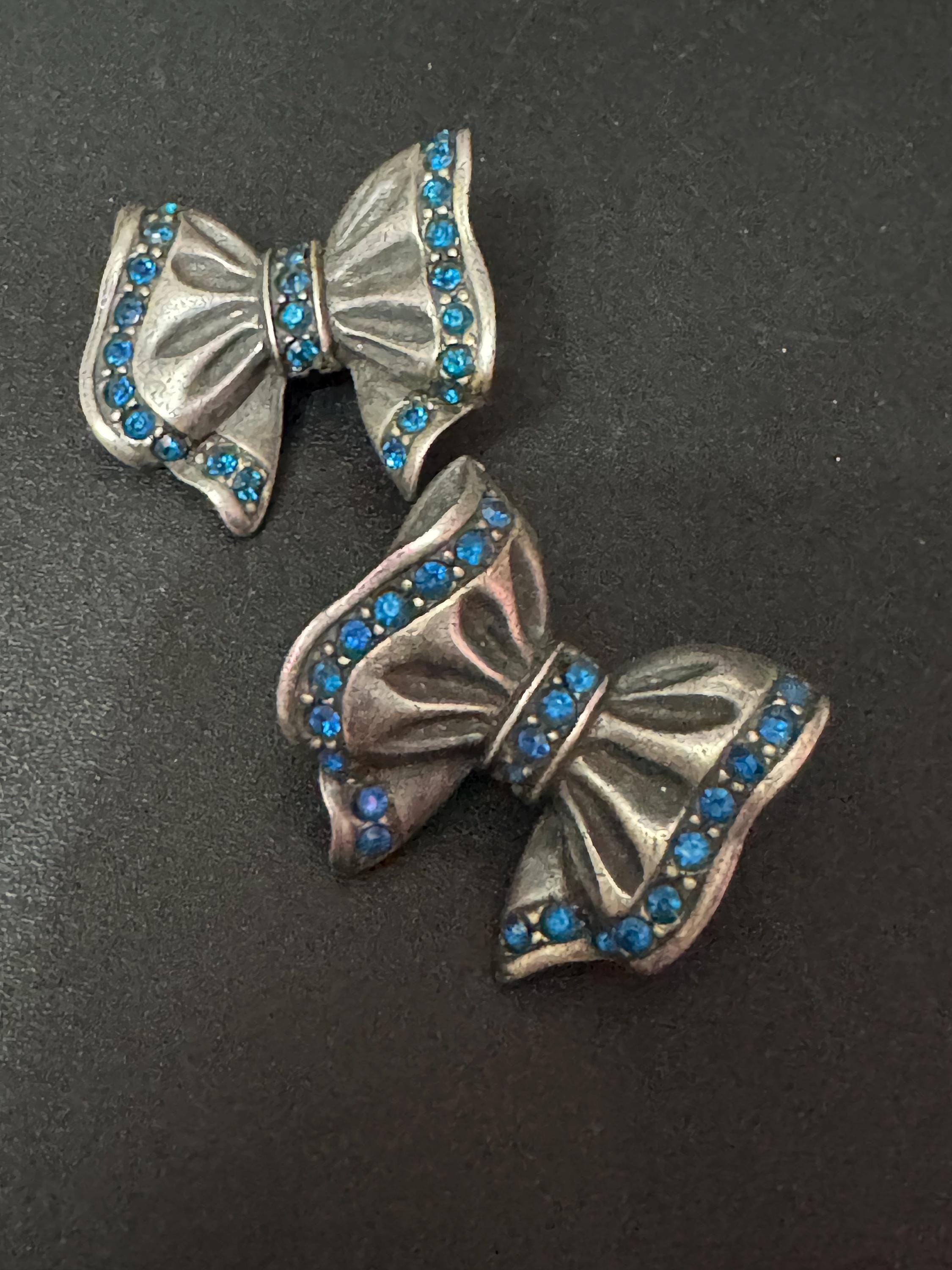 Signed ASKEW Oversized sapphire blue diamanté ribbon bow Antique silver tone pierced stud earrings