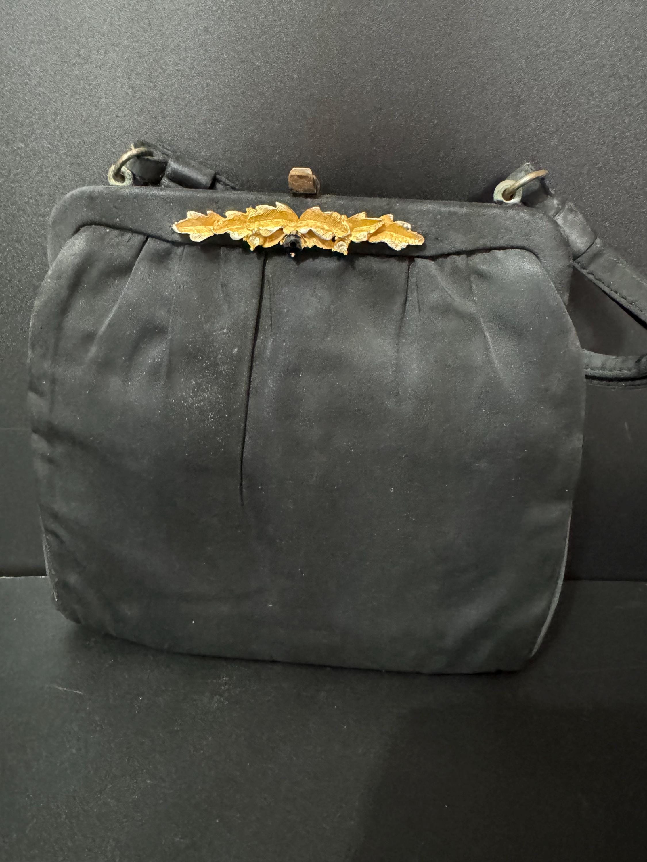 Signed Vintage little black satin evening purse with ornate brass detail and clasp art deco