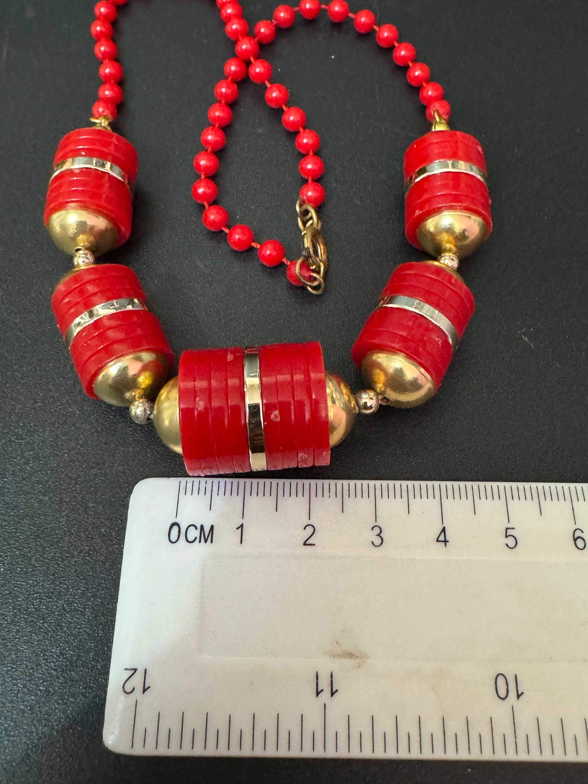 Vintage Modernist art deco style gold tone barrel beaded collar necklace bright cherry red plastic beads