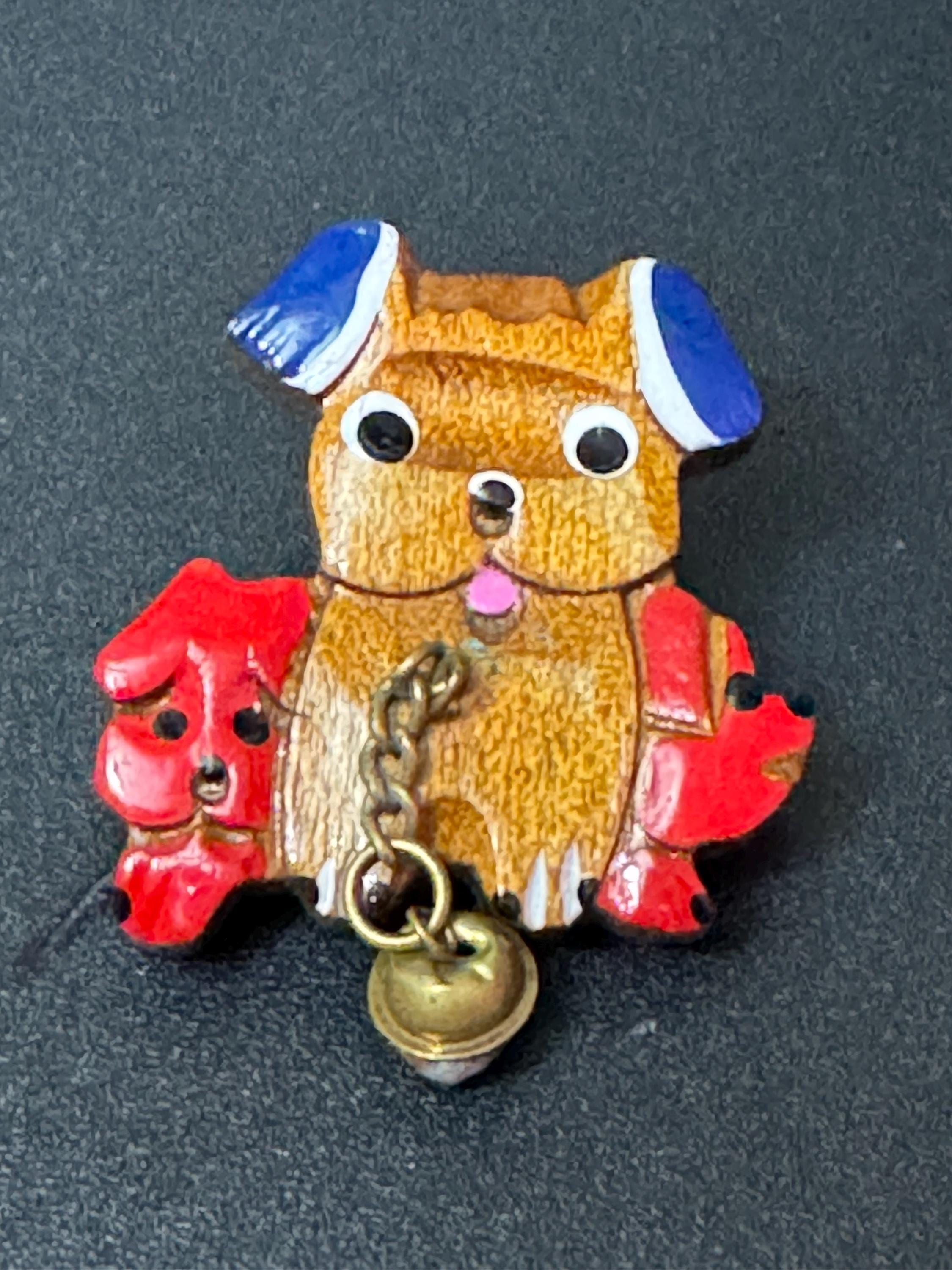 Early wooden brown novelty dog brooch, stamped foreign with brass bells mid century