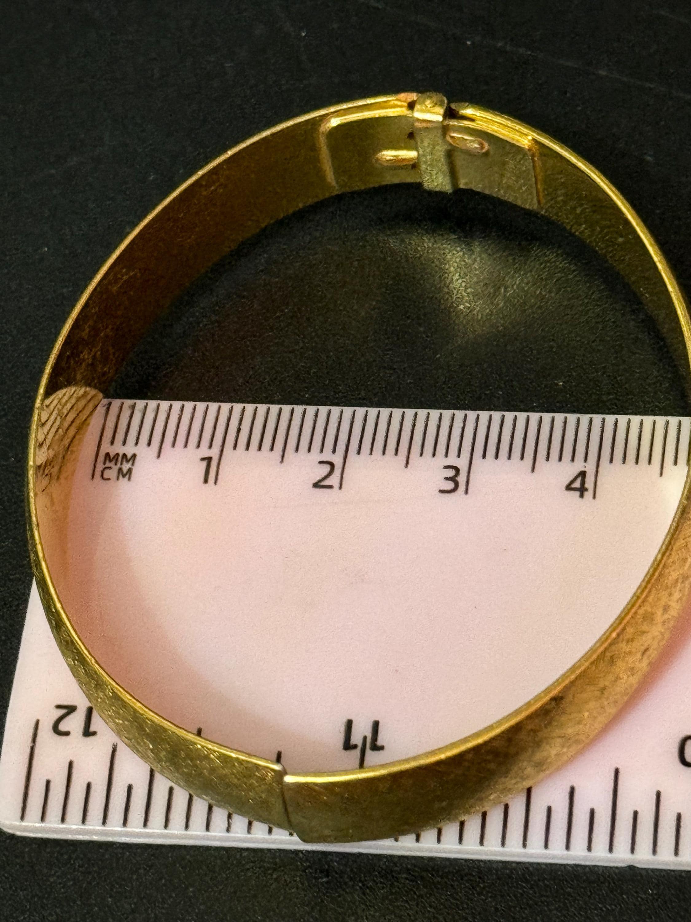 designer MONET signed brushed gold tone 1cm wide hinged clamper bangle bracelet