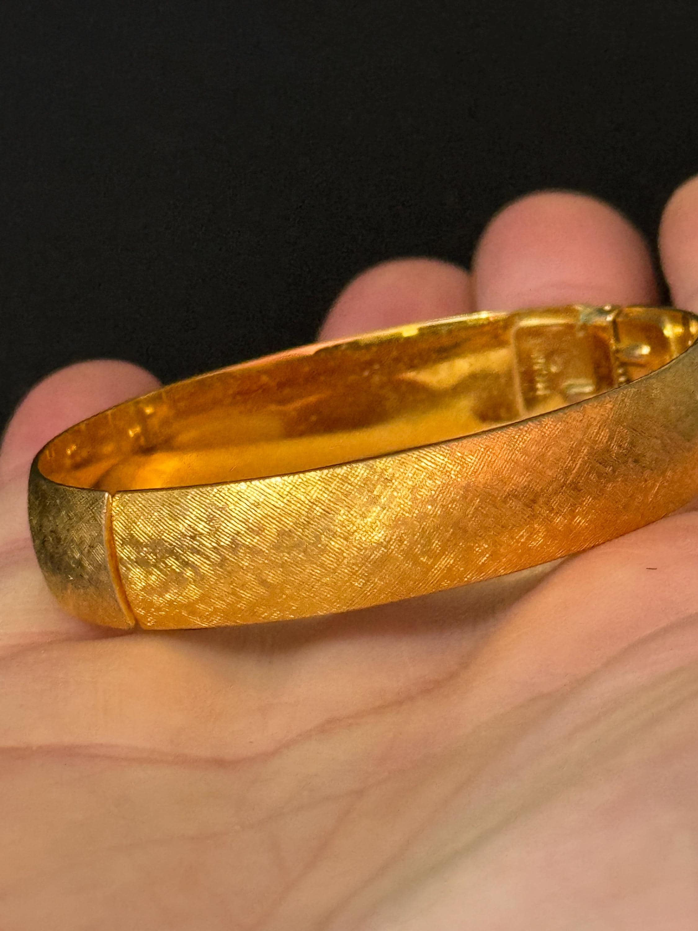 designer MONET signed brushed gold tone 1cm wide hinged clamper bangle bracelet