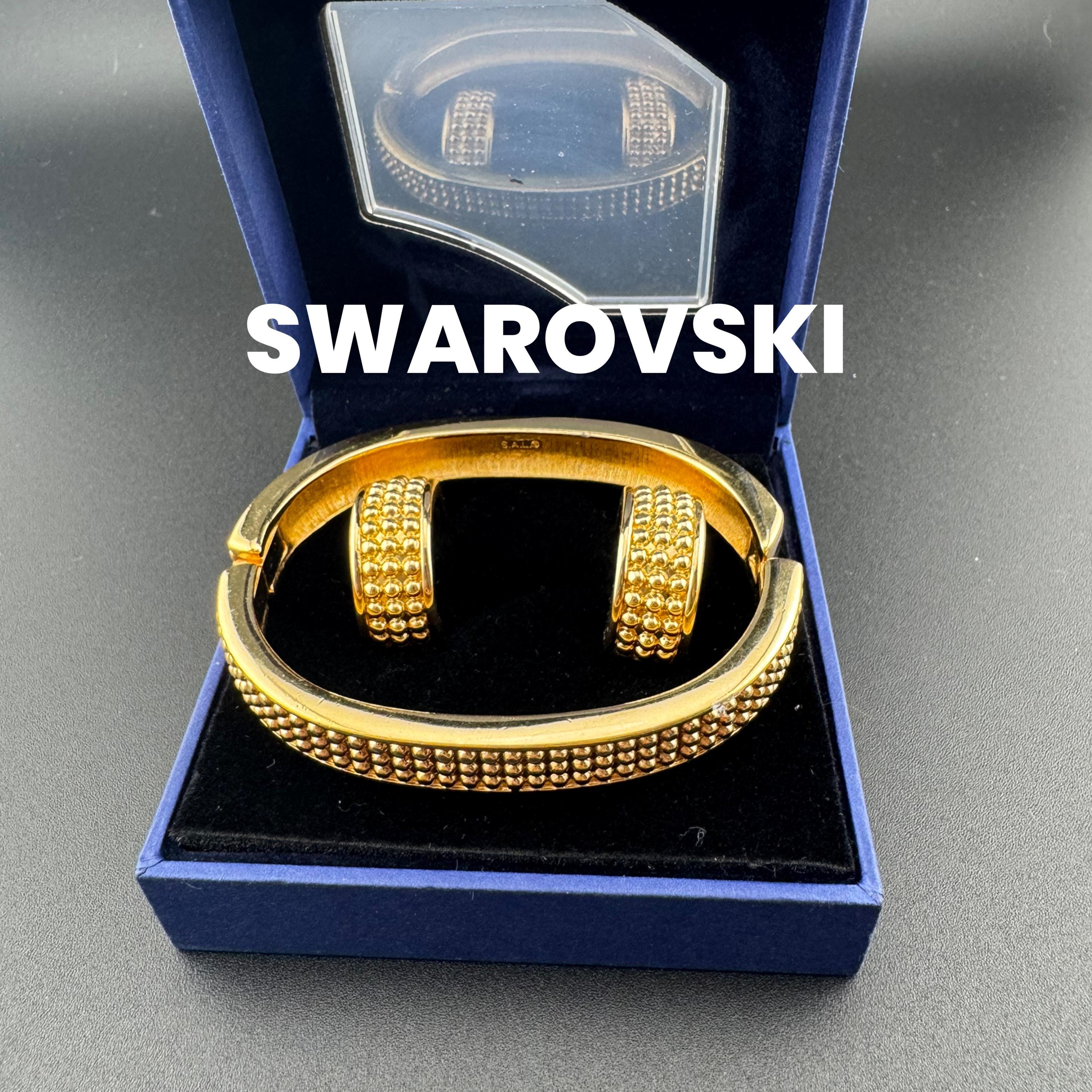 signed swan Swarovski wide gold plated clamper bangle and matching hoop earrings  for pierced ears