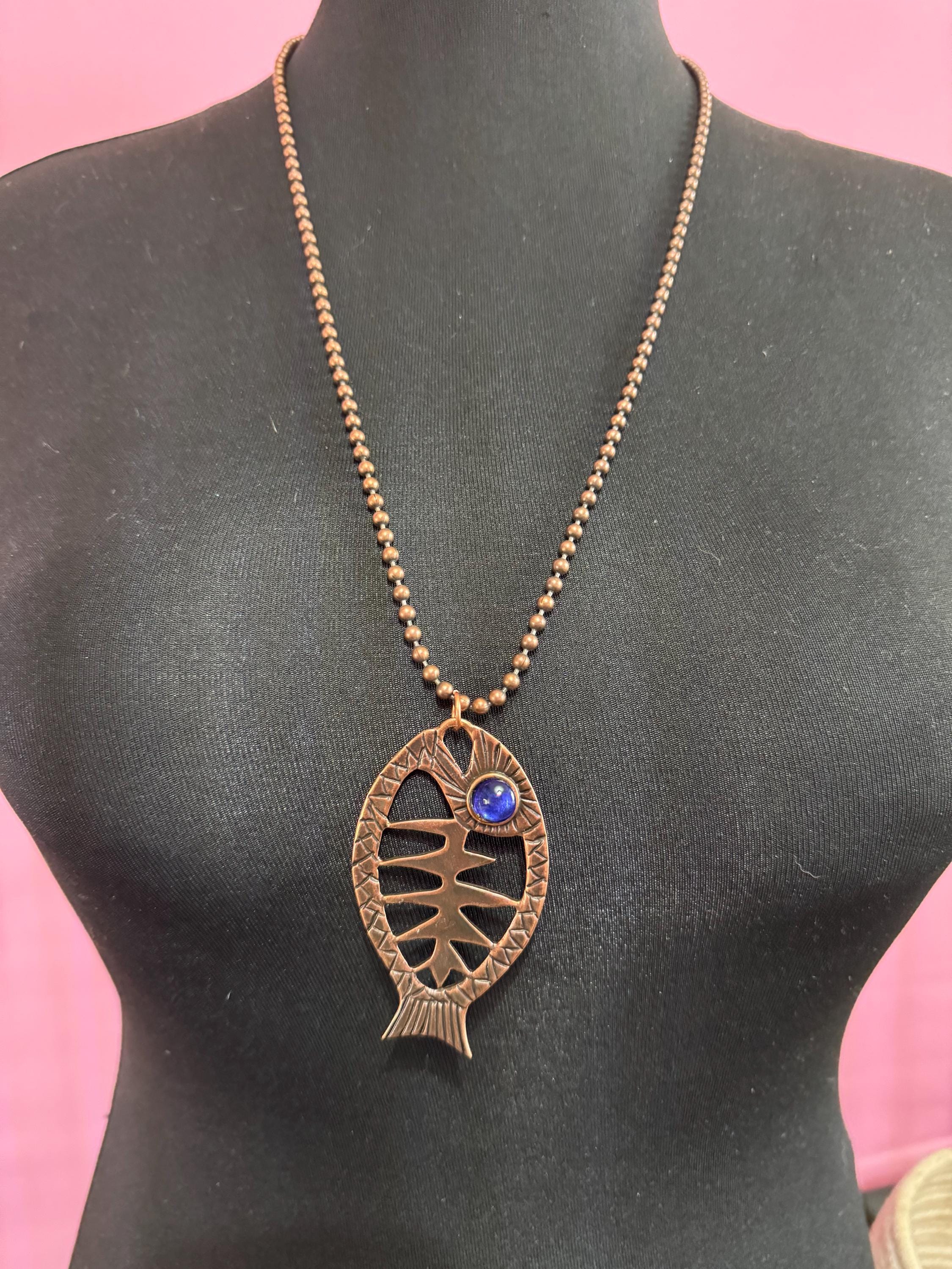 Vintage c 1980s copper tone fish pendant on a 75cm ball bead long chain necklace, blue glass eyes on both sides