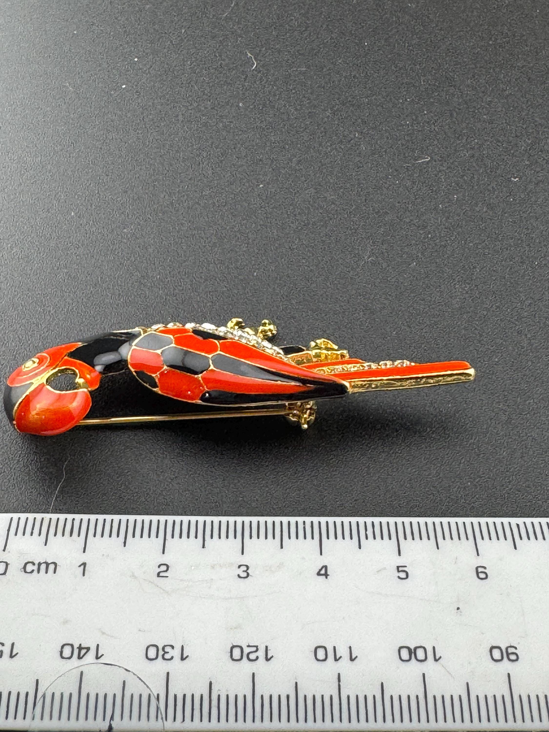 Vintage Tropical Parrot brooch set with Paste diamanté and black orange Enamel gold tone metal 1980s