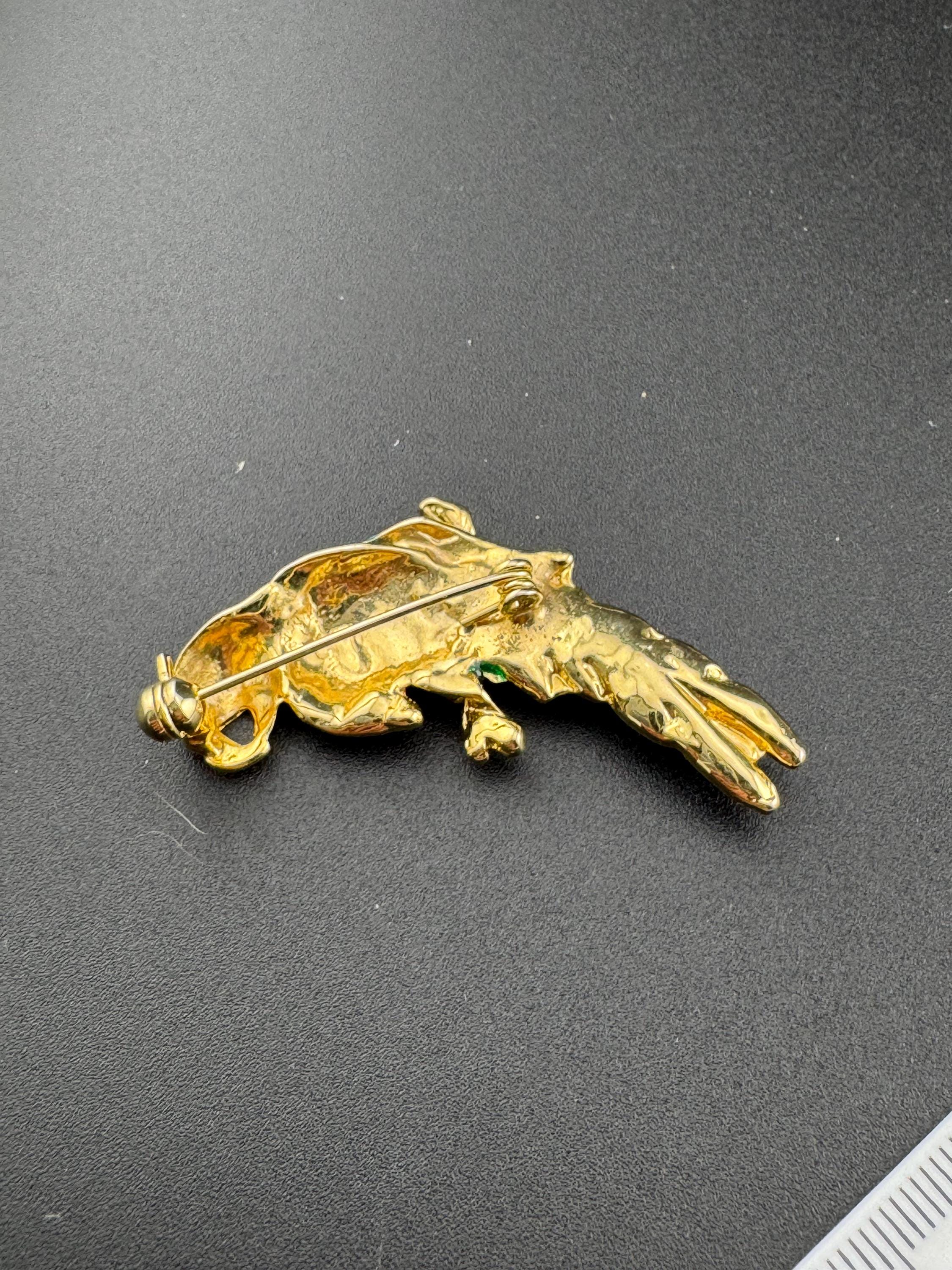Vintage Tropical Parrot brooch set with Paste diamanté and red green Enamel gold tone metal 1980s