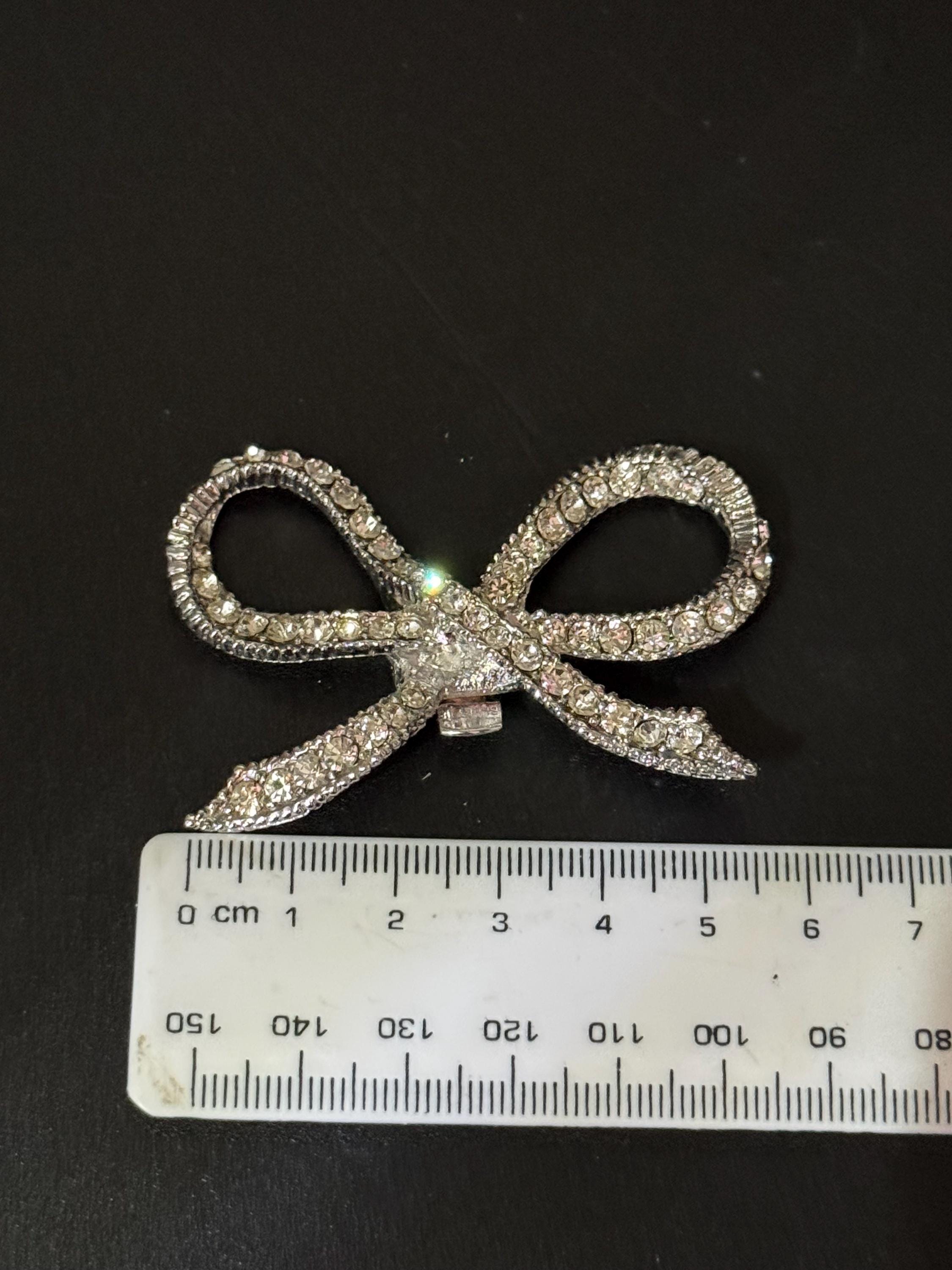 vintage Swarovski rhinestone pair of silver tone bow shoe or dress clip clear Glass diamanté paste 6cm wide