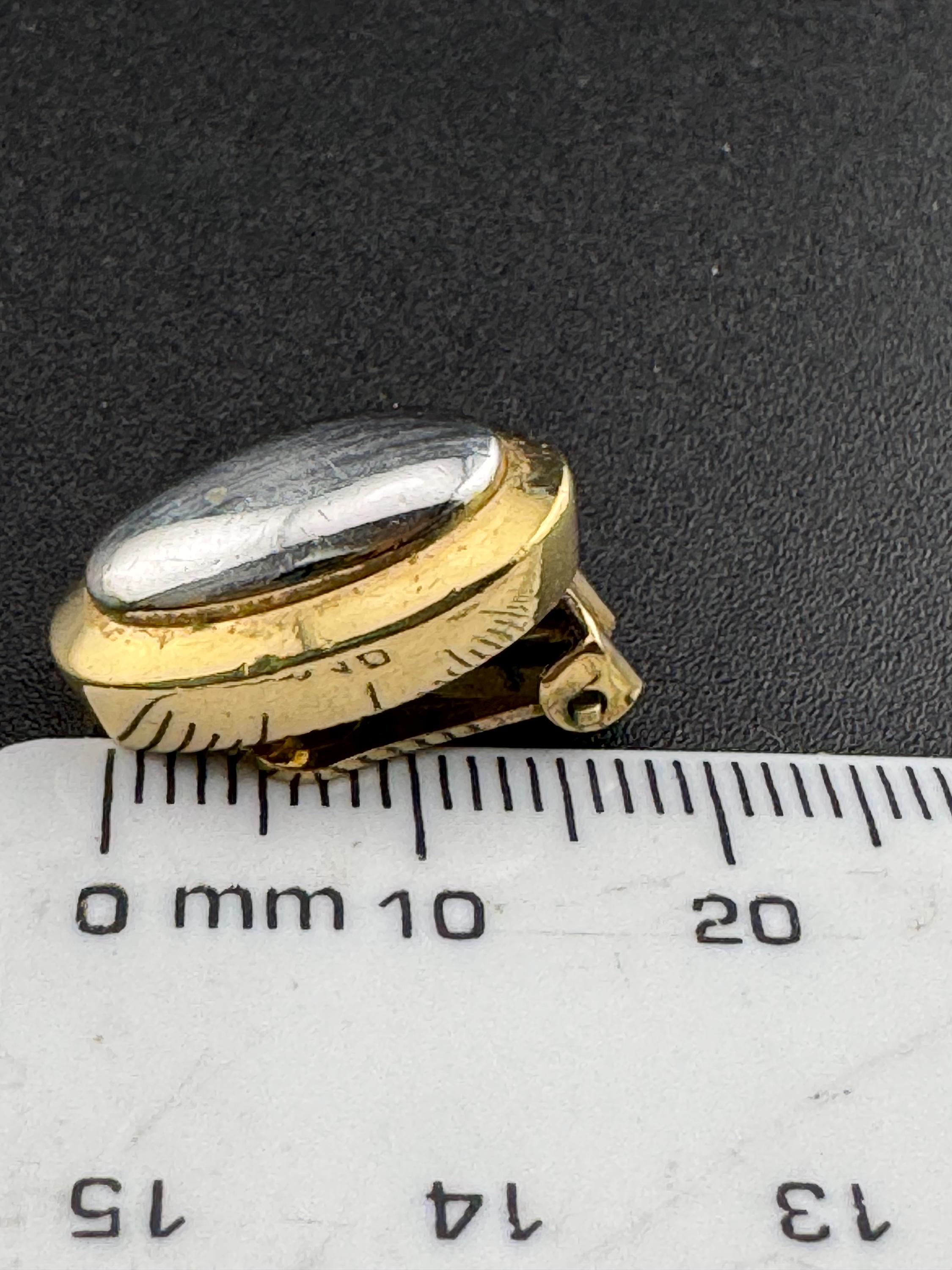 Vintage signed GROSSE gold tone and silver small oval pierced stud earrings