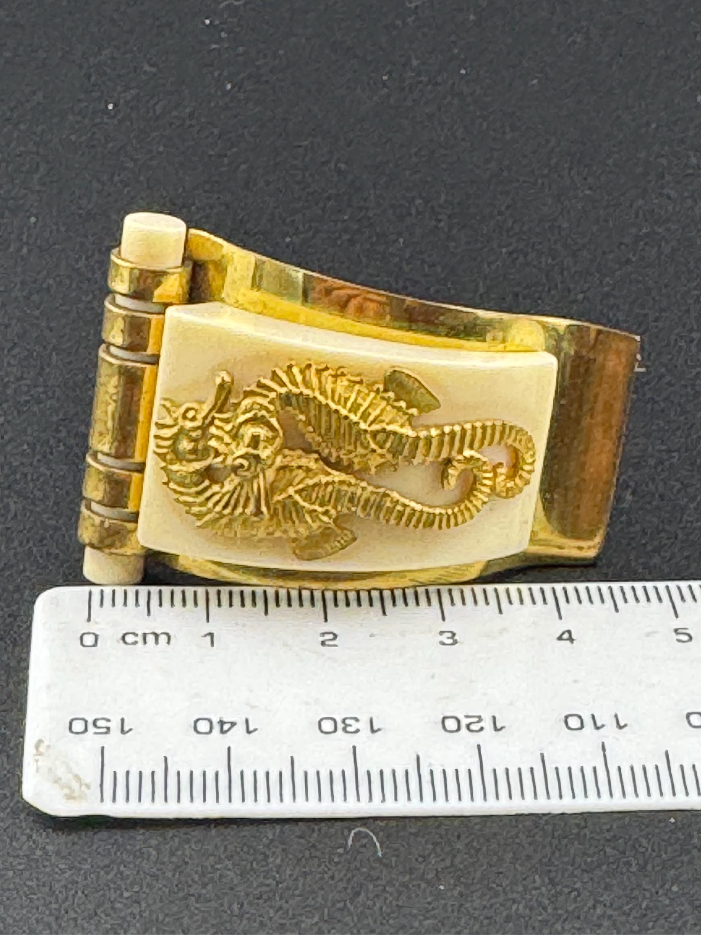 vintage Jean Painlevé French Bakelite and brass seahorse dress clip 1930s