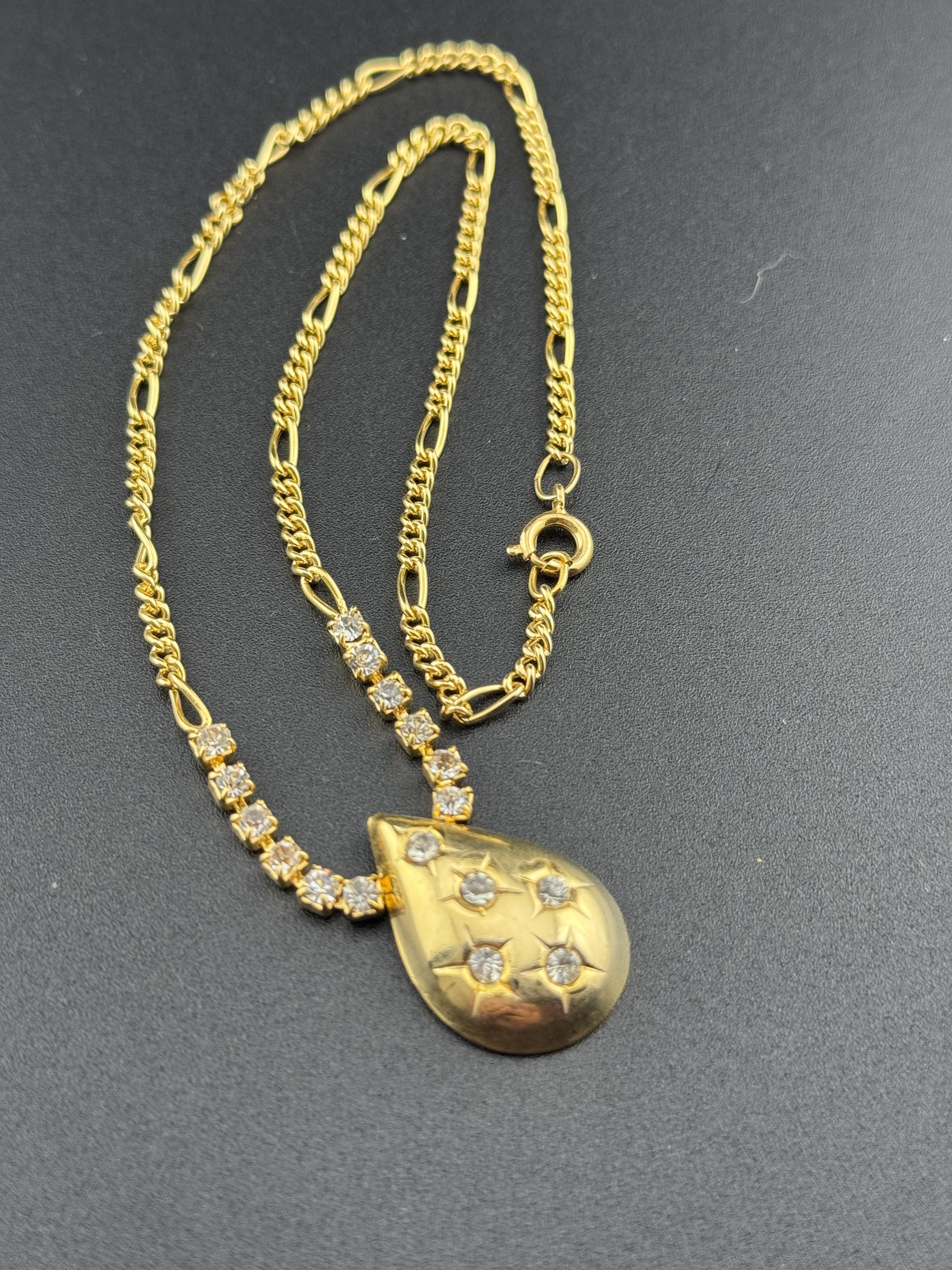 Vintage 1990s gold tone diamanté figaro chain link necklace with star cut rhinestone teardrop pendant