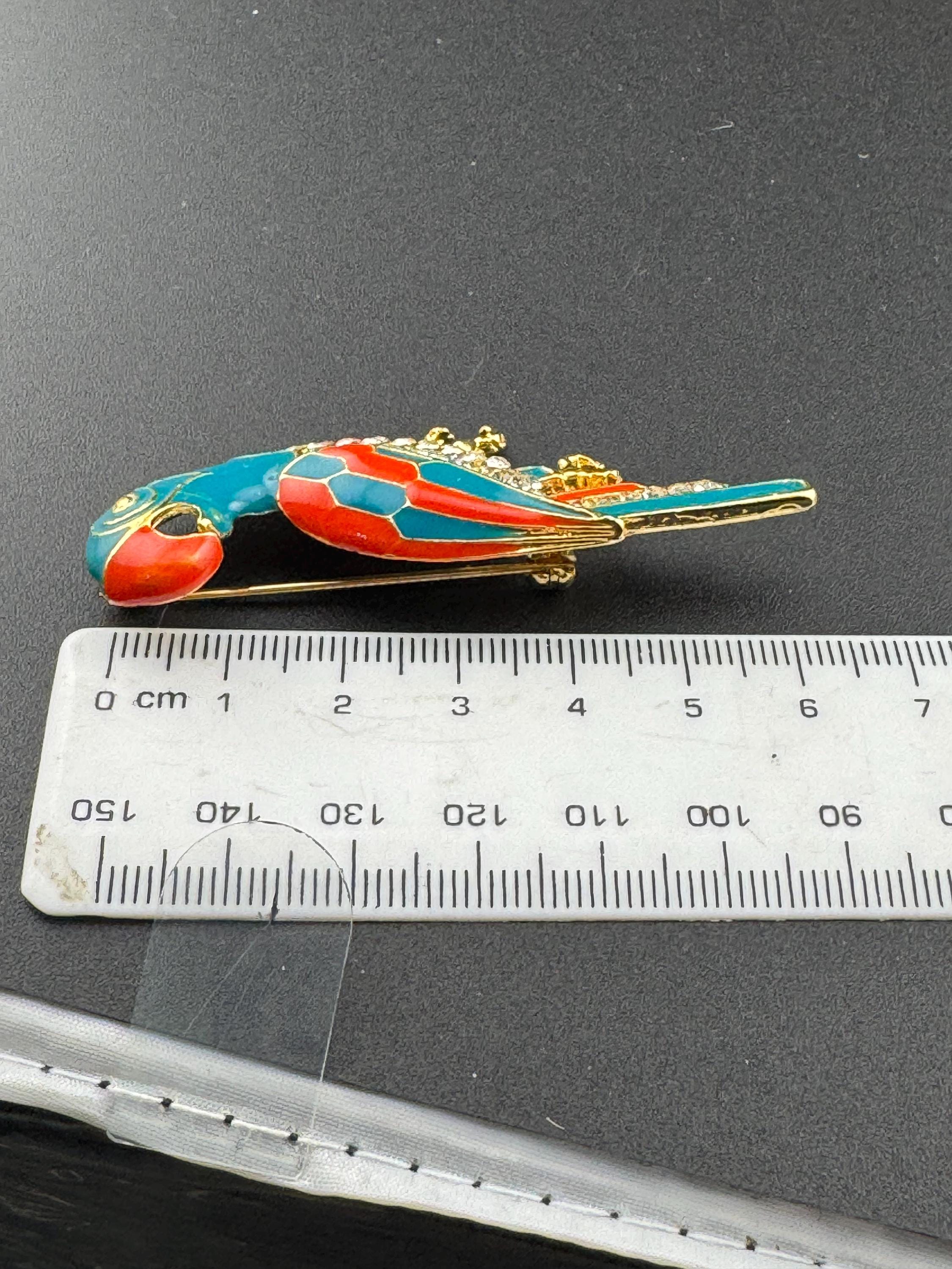 Vintage Tropical Parrot brooch set with Paste diamanté and blue orange Enamel gold tone metal 1980s