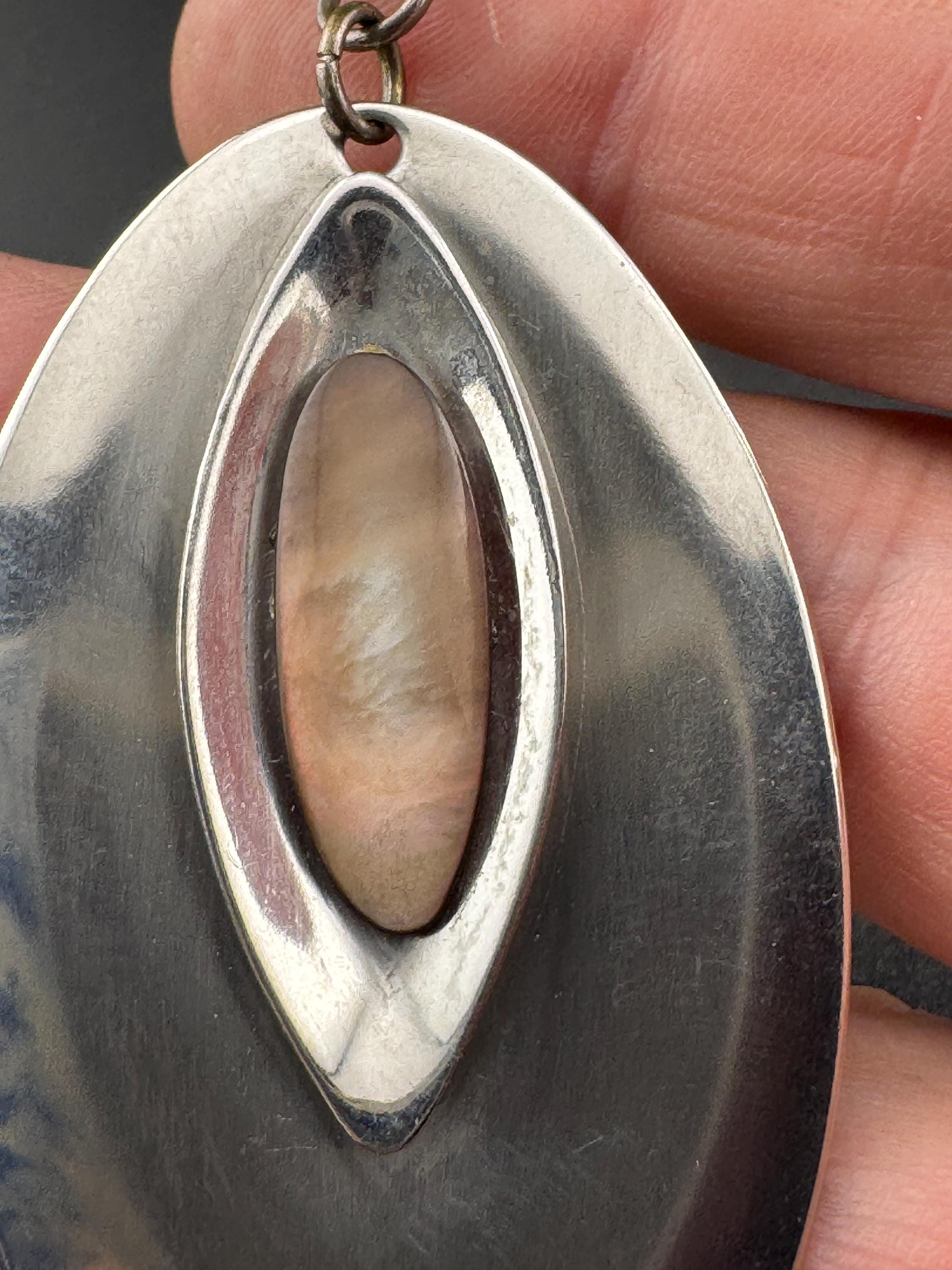 Vintage Modernist silver tone stainless steel pendant necklace and chain set with central pink taupe cabochon 1970s