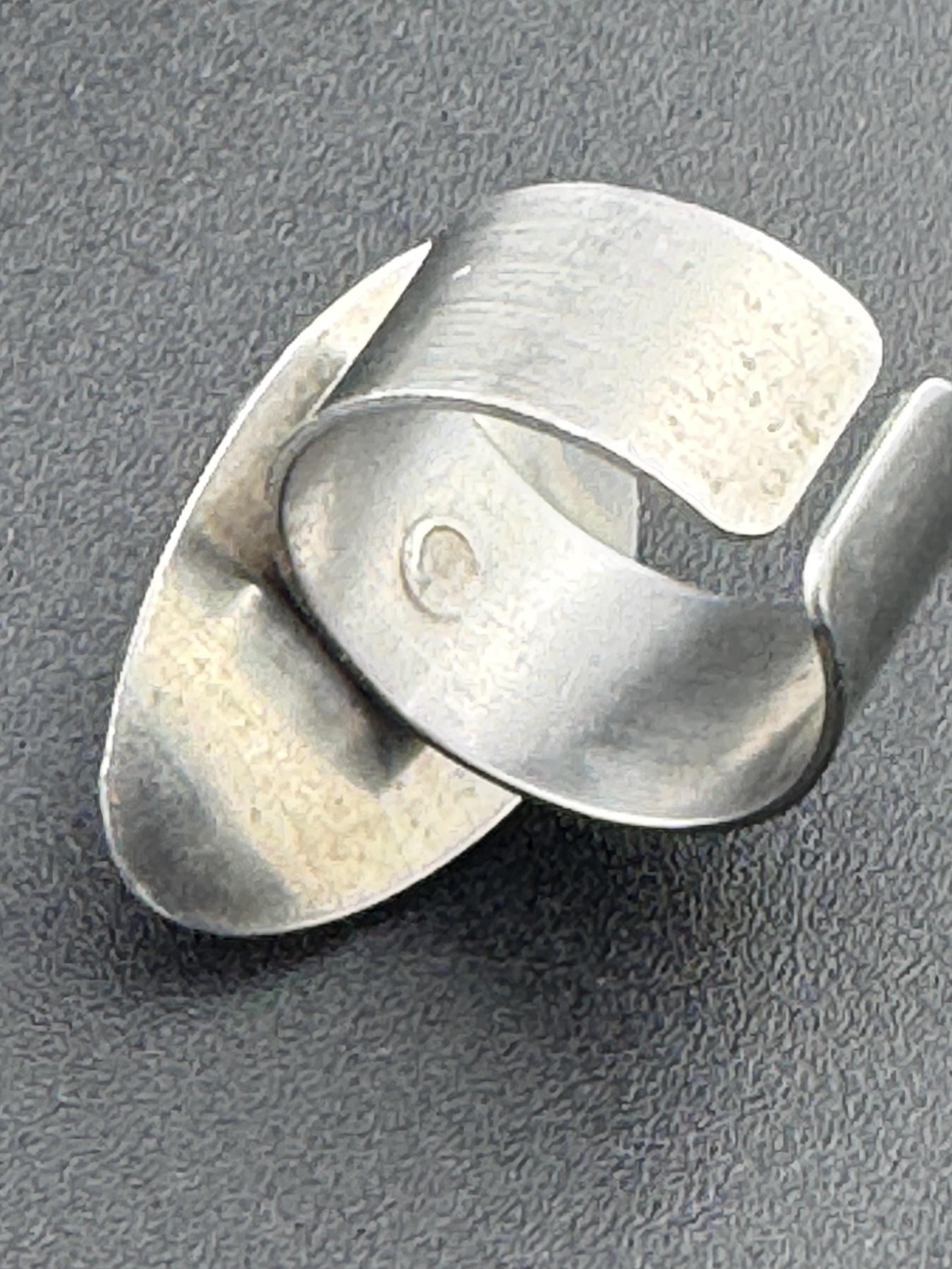 1970s vintage stainless steel silver metal adjustable ring with central orange cabochon mid century