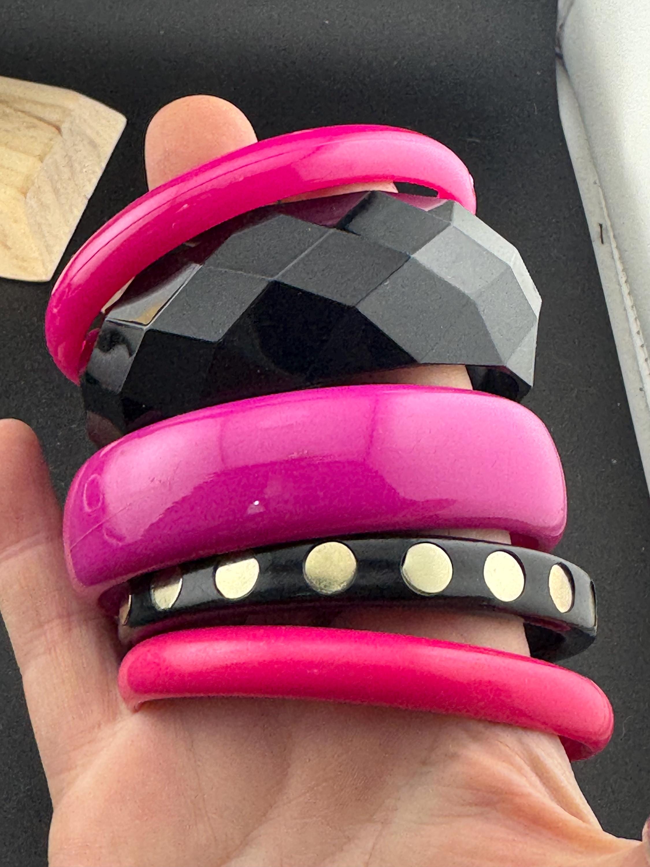 Vintage stack of black and bright hot pink Chunky stylish plastic bangles retro acrylic bracelets
