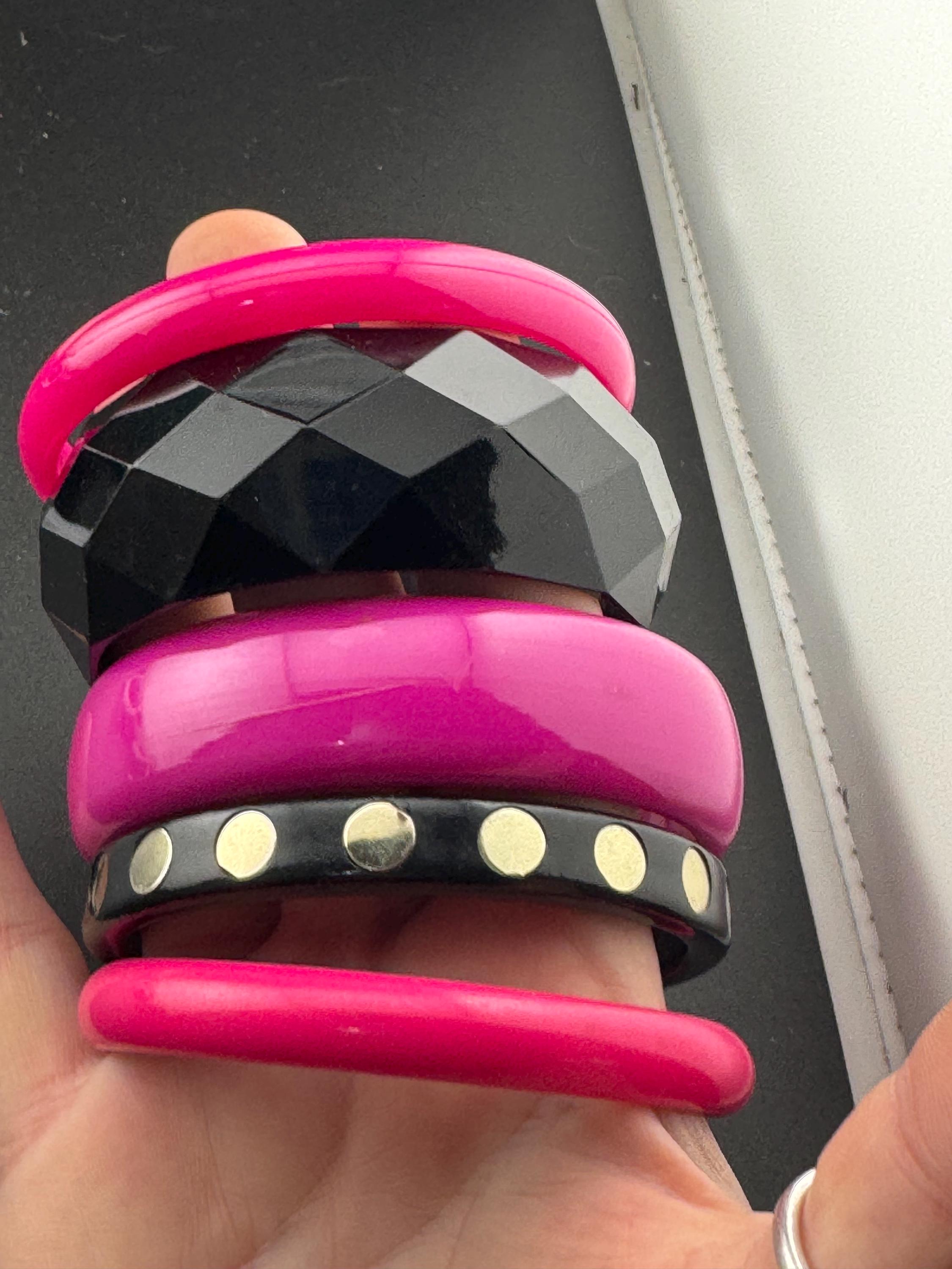 Vintage stack of black and bright hot pink Chunky stylish plastic bangles retro acrylic bracelets